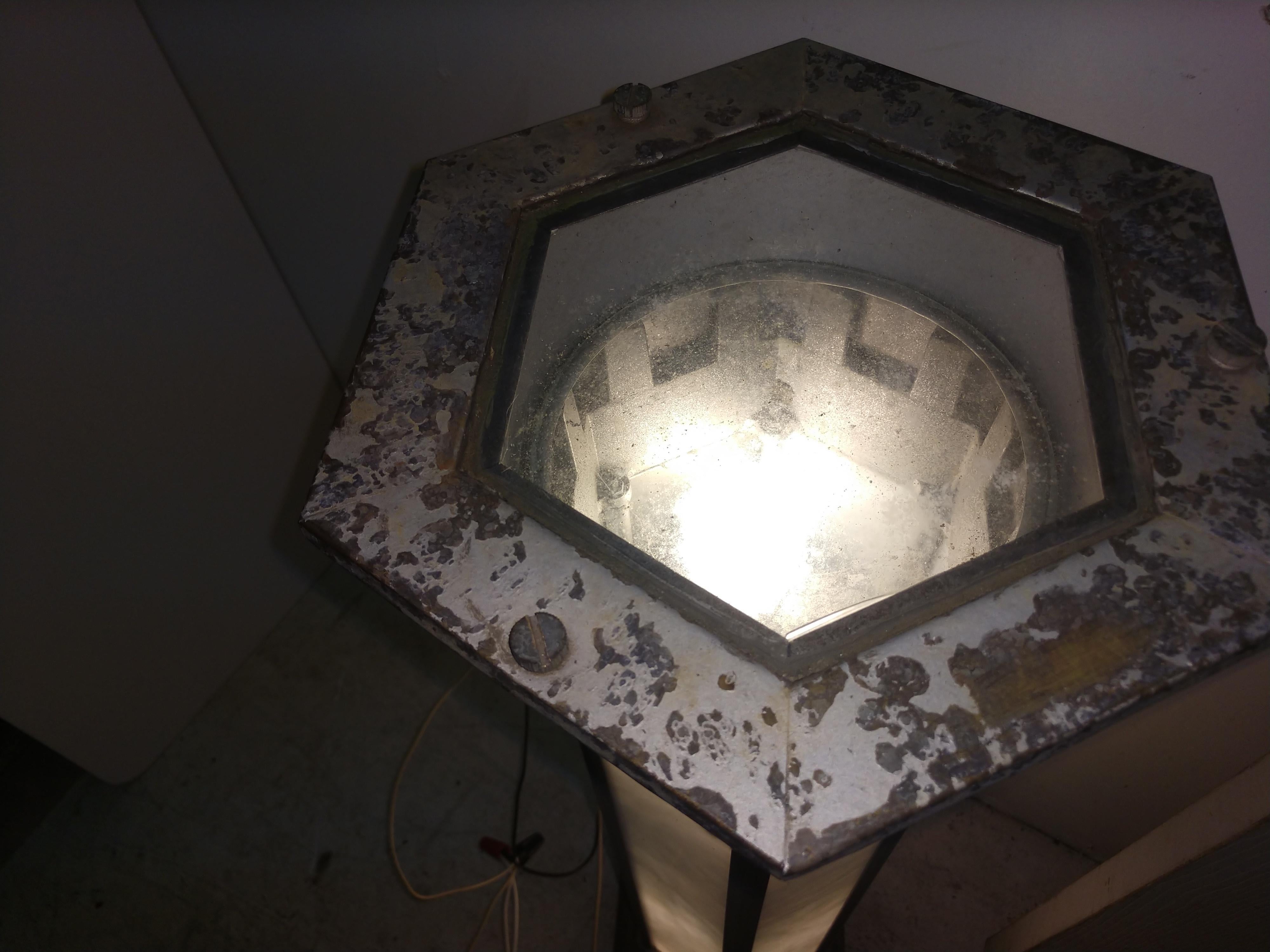 Fantastic and tall. Well constructed cast aluminum and copper with 4 sockets for illumination. White slag glass marbled panels are perfect. These are very impressive when either lit or not, statuesque. Could use a fresh coat of paint. Priced and