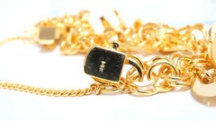 Eight Charms Link Bracelet 14kt Gold 43gm