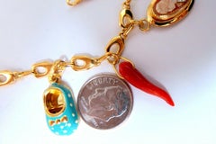 Eight Charms Link Bracelet 14kt gold 7.5 inch 14gm