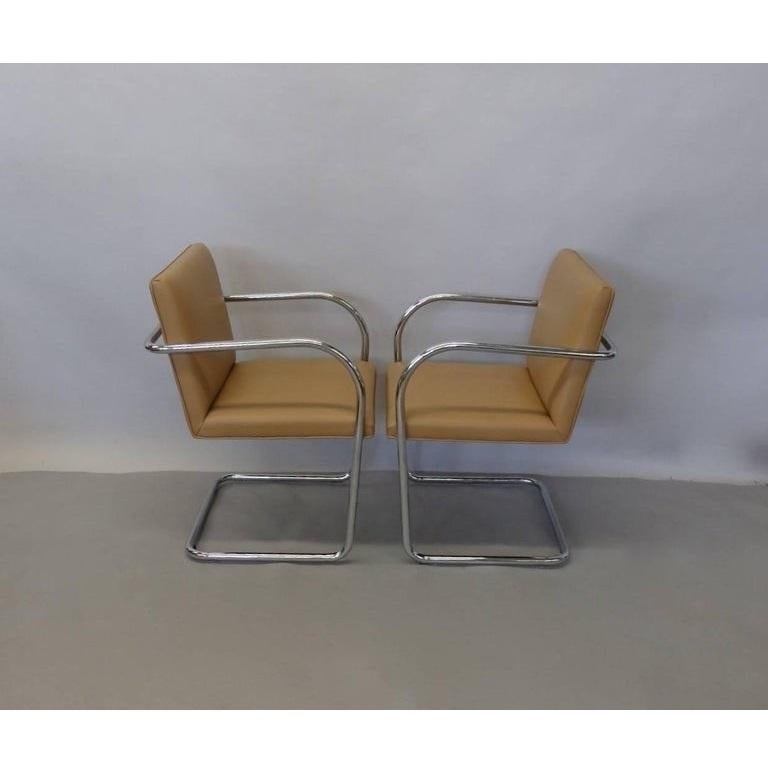 Completely restored set of eight tubular Brno chairs by Mies van der Rohe for Knoll. Professionally re-upholstered in camel color and the chrome is in great condition. 