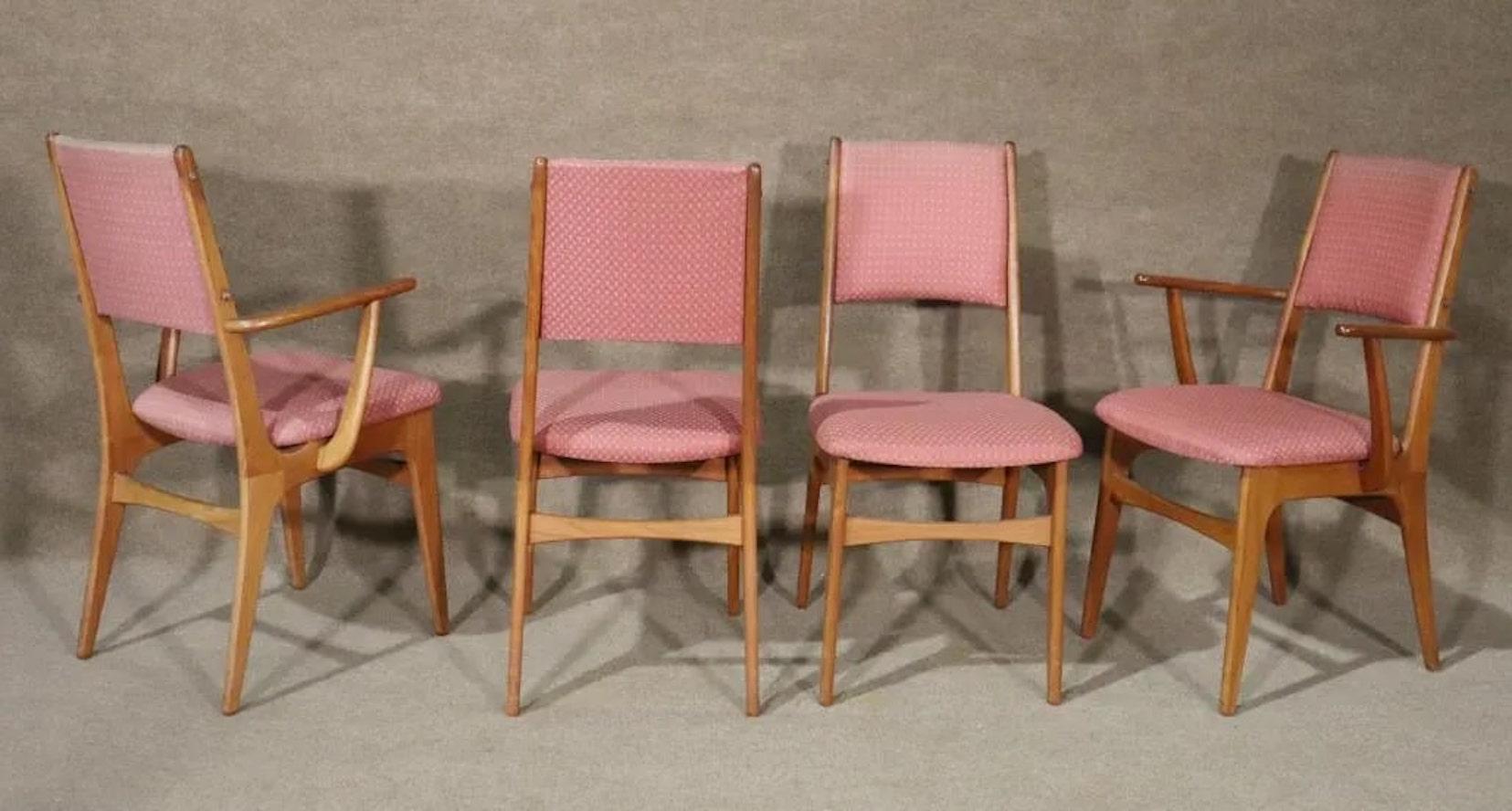 Set of eight dining chairs with teak wood frames. Danish made in the 1960s with simple and handsome design. Two armchairs and six side chairs.
side chairs Measure 36