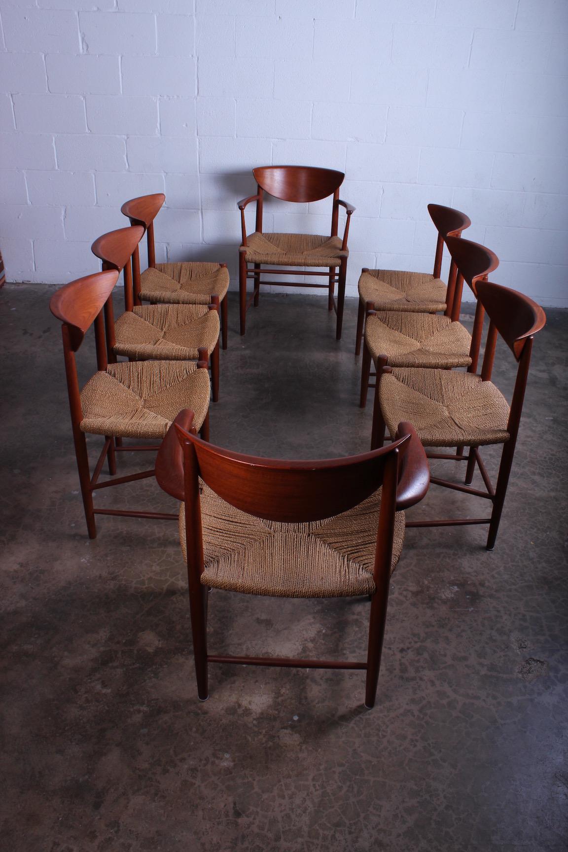 Set of eight teak and paper cord dining chairs designed by Peter Hvidt and Orla Mølgaard Nielsen for Søborg Møbelfabrik.