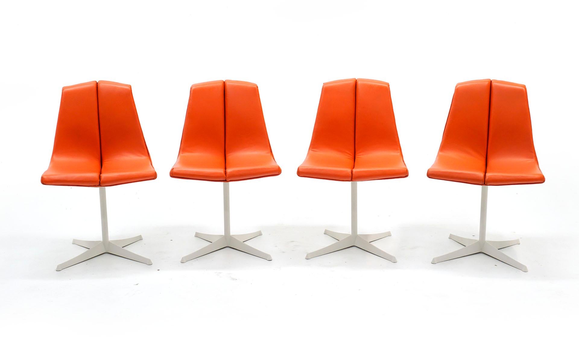 Set of 8 Richard Schultz dining chairs, made by Knoll, 1960s. The frames and seat backs have been expertly refinished in a soft white / ivory color and the original red orange seats have been restored and are in excellent condition with few, if any,