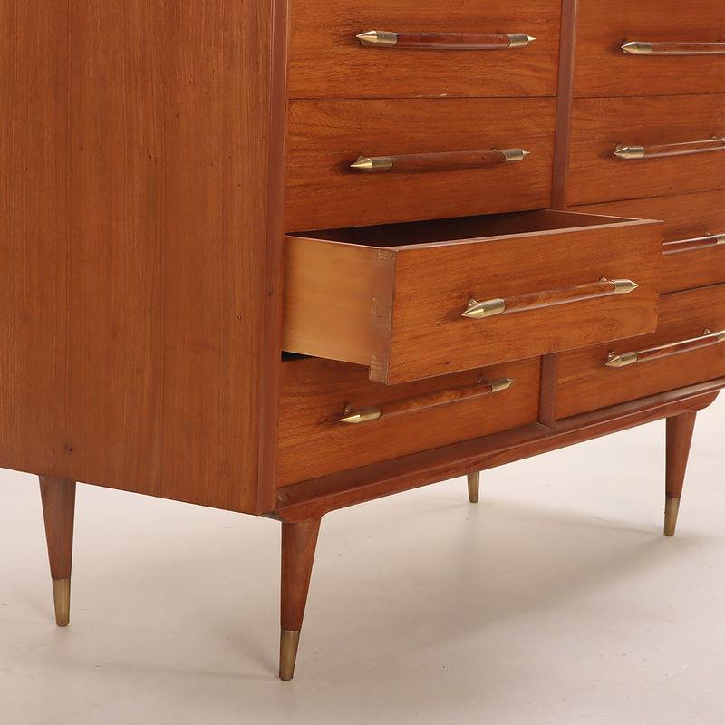 Eight drawer dresser with elongated wood and brass handles In Good Condition For Sale In Pineville, NC