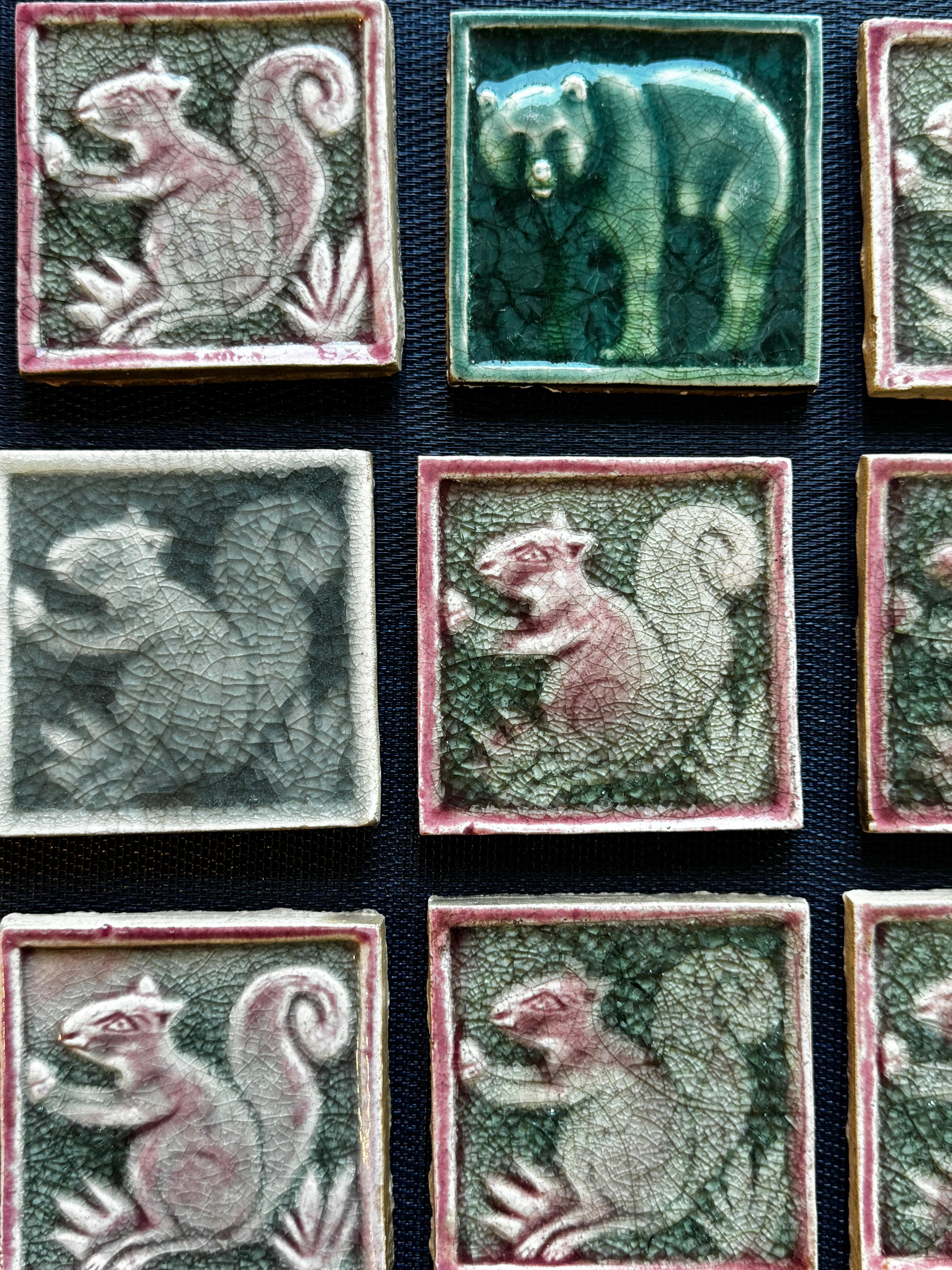 Nine Early 20th Century Glazed Tiles 

Eight depicting squirrels, 1 bear

4