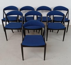 Eight Ebonized Customizable Kai Kristiansen Dining Chairs in Excellent Condition