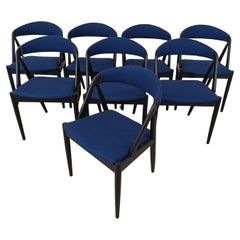 Eight Ebonized Customizable Kai Kristiansen Dining Chairs in Excellent Condition