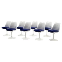 Eight Eero Saarinen White Tulip Dining Chairs w/ Swivel for Knoll.  Blue Seats.