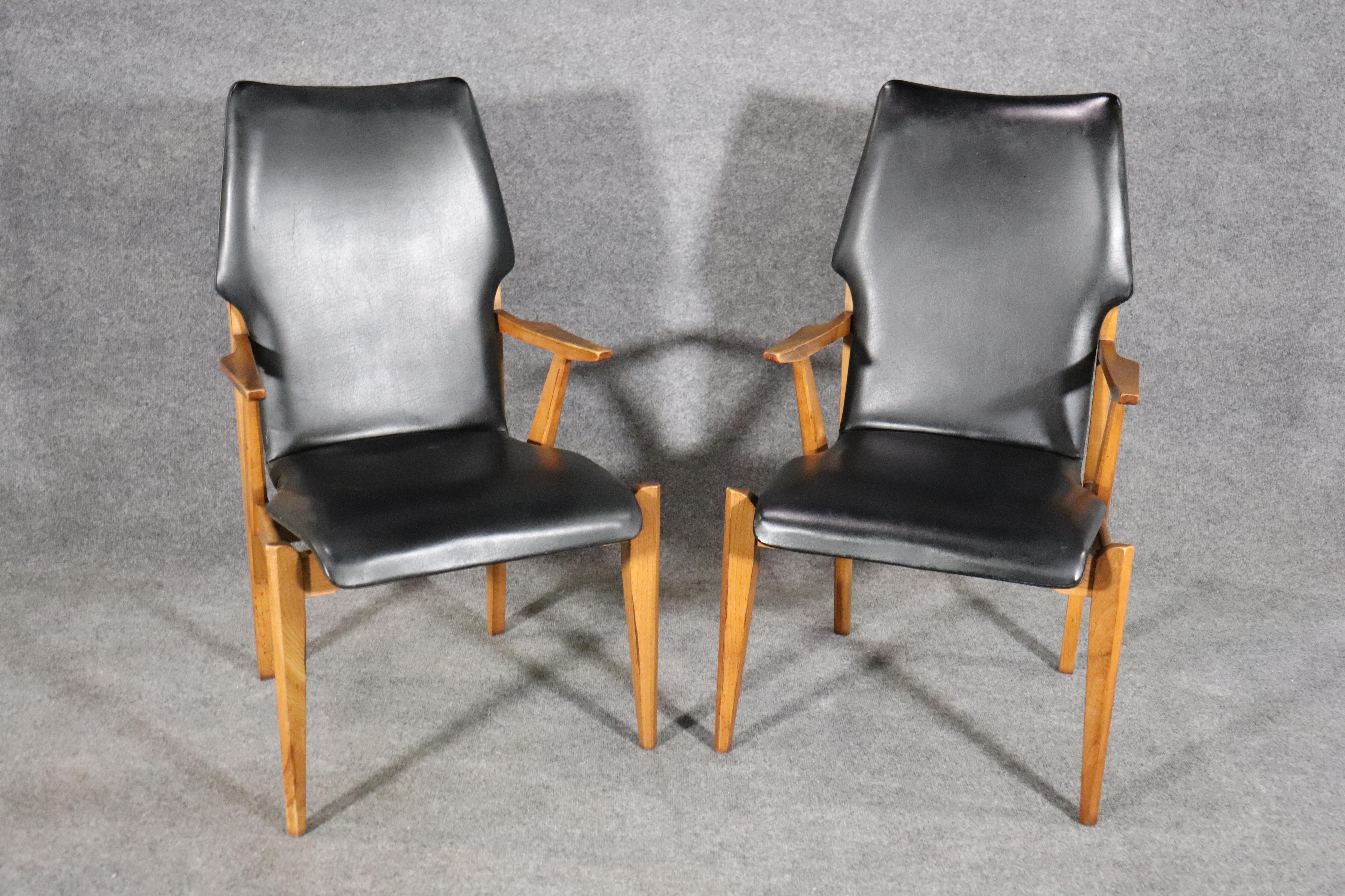 Set of eight dining chairs by Lane Furniture with bentwood seat and back set in a strong walnut frame. Black Naugahyde fabric, two armchairs.
Please confirm location.