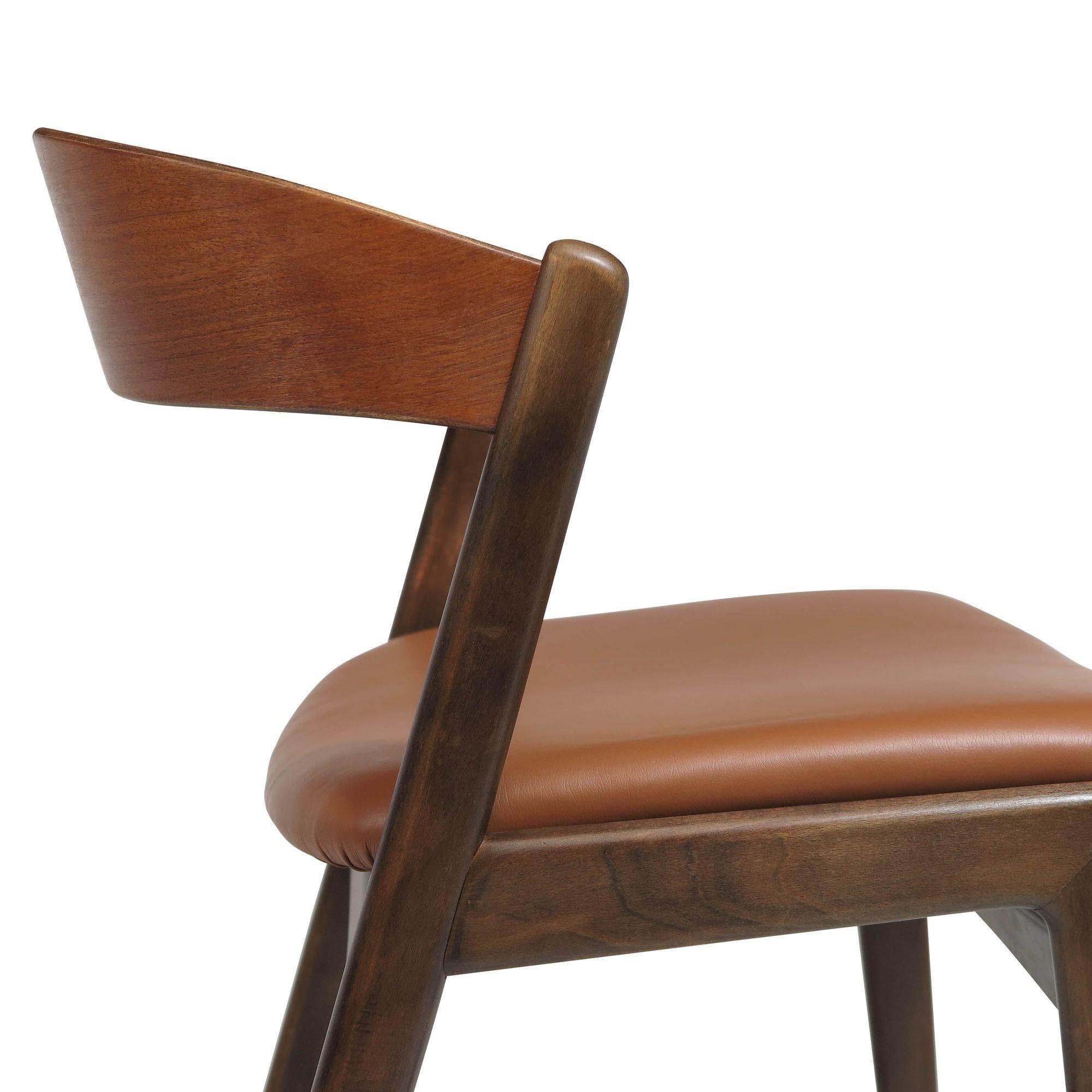 20ième siècle Huit chaises de salle à manger danoises en noyer à dossier incurvé Folke Ohlsson for Dux en vente