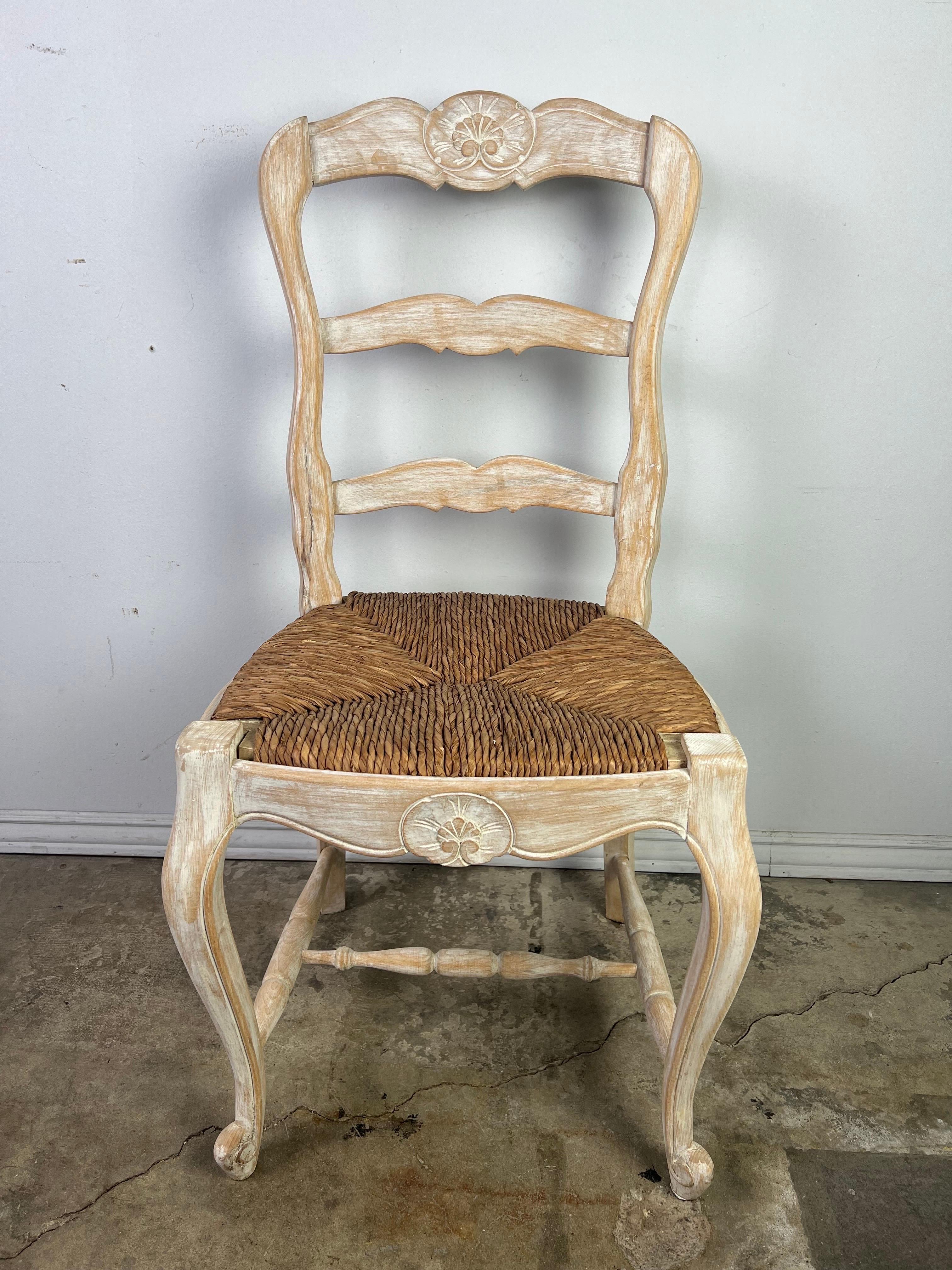 Eight French Ladder Back Dining Chairs with Rush Seats In Distressed Condition In Los Angeles, CA