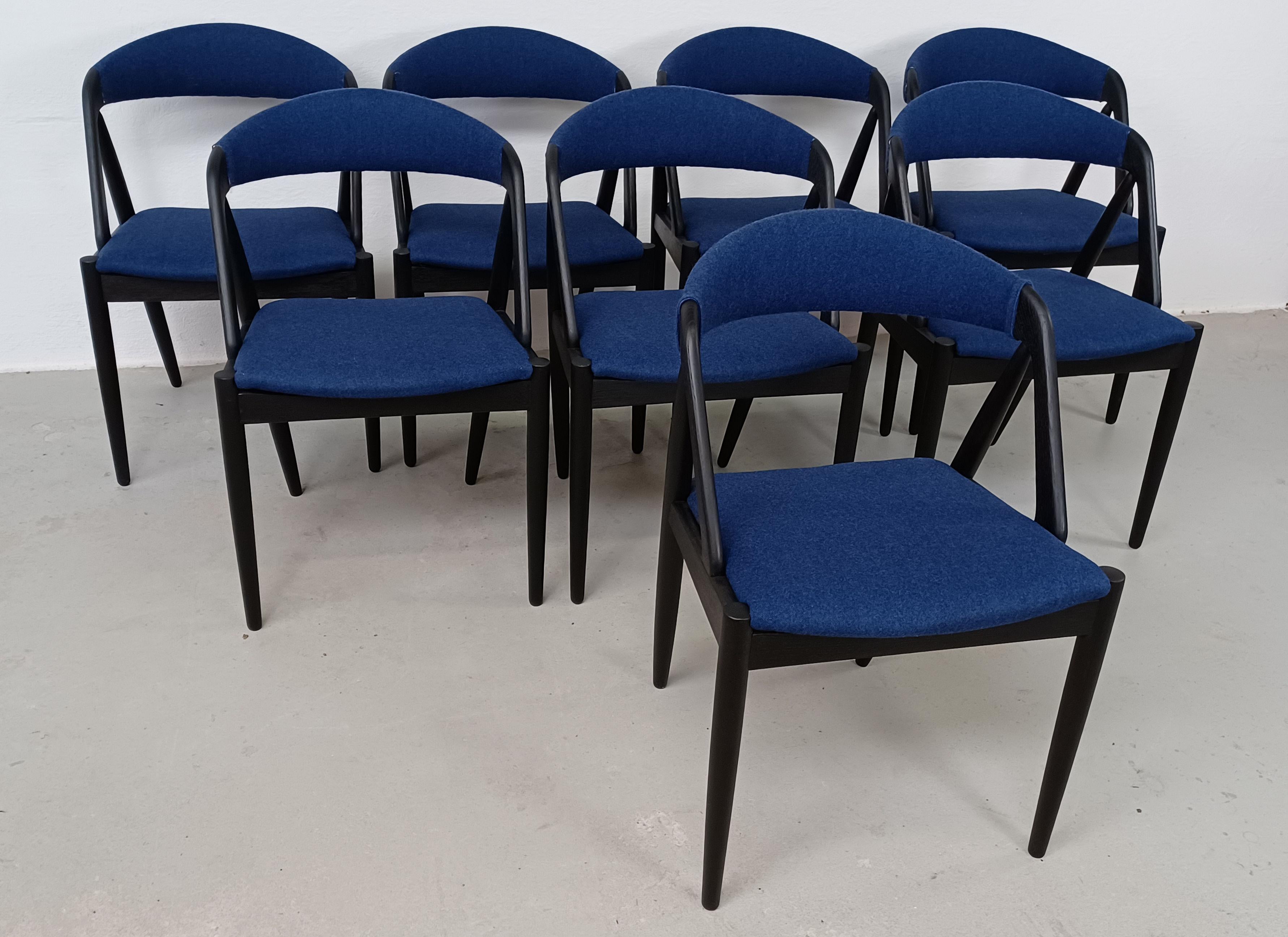 Set of eight fully restored ebonized and reupholstered Kai Kristiansen Oak Dining Chairs

The A-frame model 31 dining chairs were designed by Kai Kristiansen in 1956 for Schou-Andersens Møbelfabrik and the A-frame chair is one of the most well-known