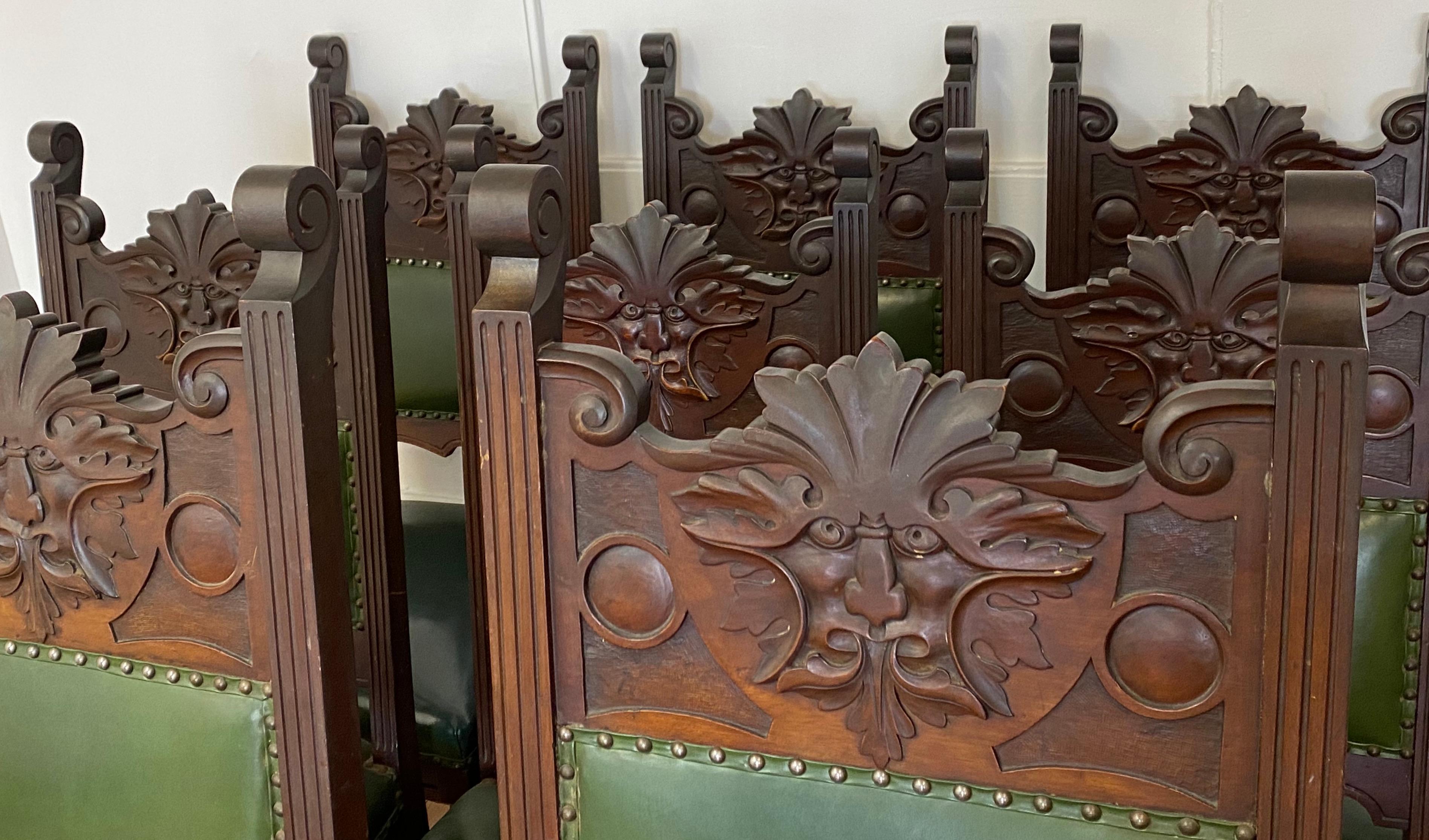 Eight Gothic style carved mahogany dining chairs 19th c.

Handsomely hand carved Gothic style dining chairs

The set includes two arm chairs and six side chairs

Each chair is covered in faux leather with brass tacks

Measures: 26