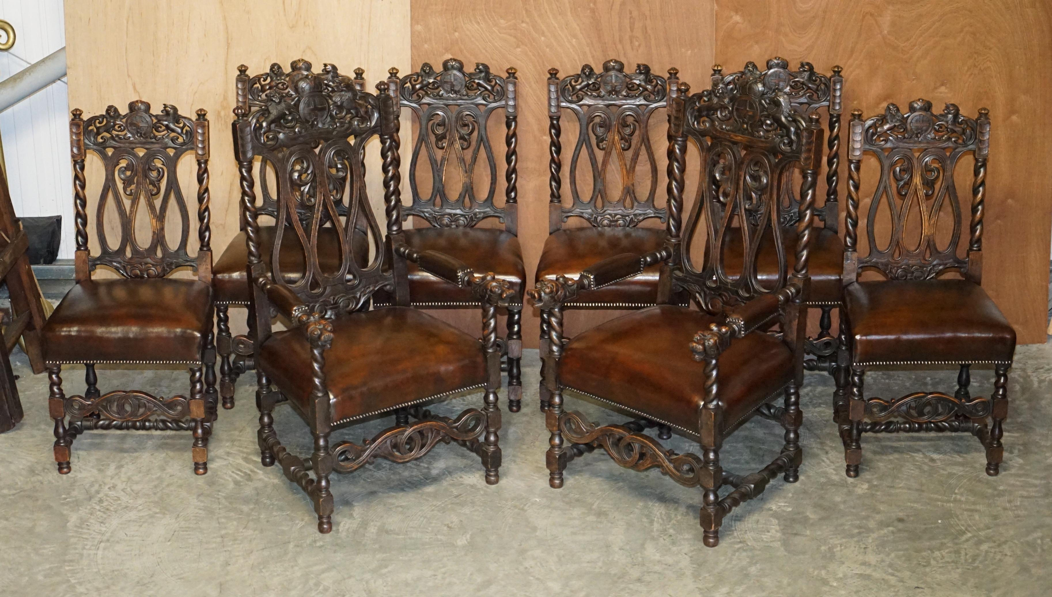 We are delighted to offer this lovely suite of eight original, early Victorian, hand carved Jacobean revival dining chairs with hand carved Armorial crest, Coat of Arms back rests and new leather upholstery which has been hand dyed

A very