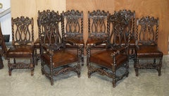 Eight Hand Carved Armorial Crest Coat of Arms Antique Jacobean Dining Chairs