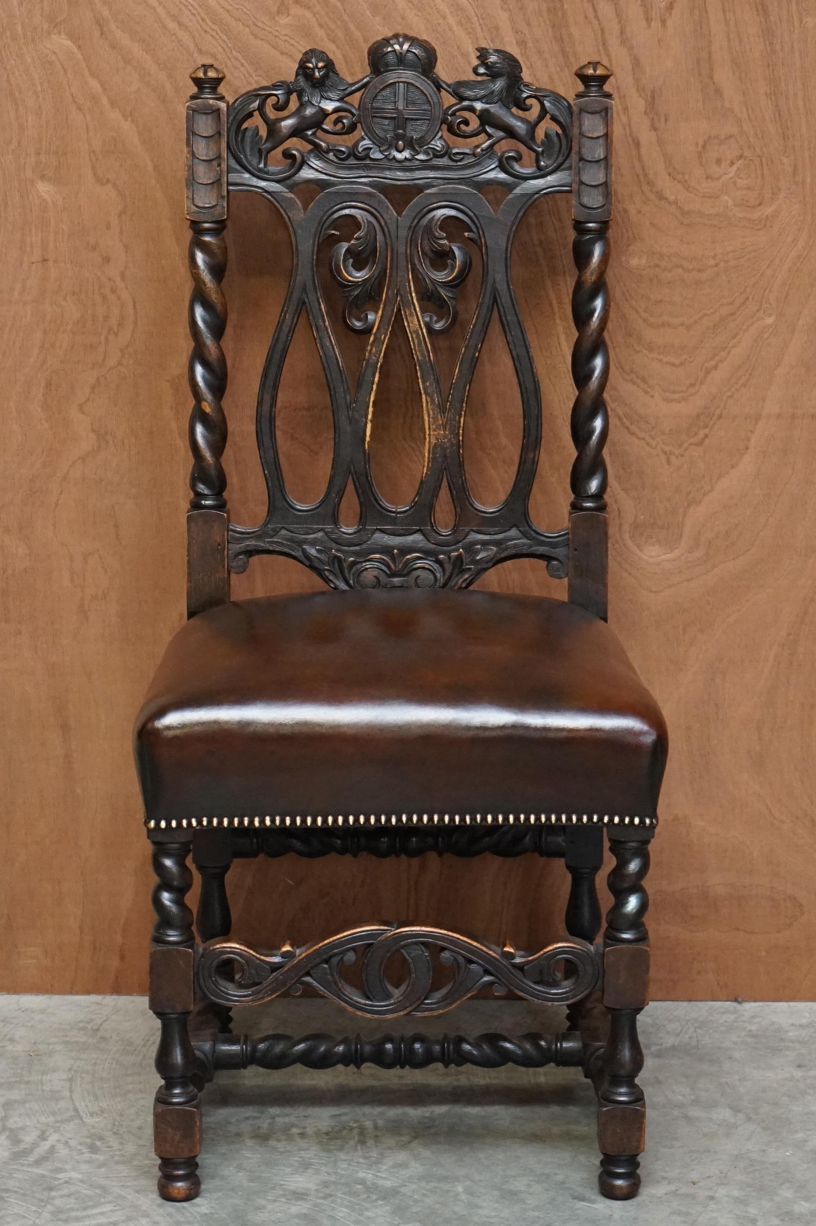 Hand-Crafted Eight Hand Carved Armorial Crest Coat of Arms Antique Jacobean Dining Chairs For Sale