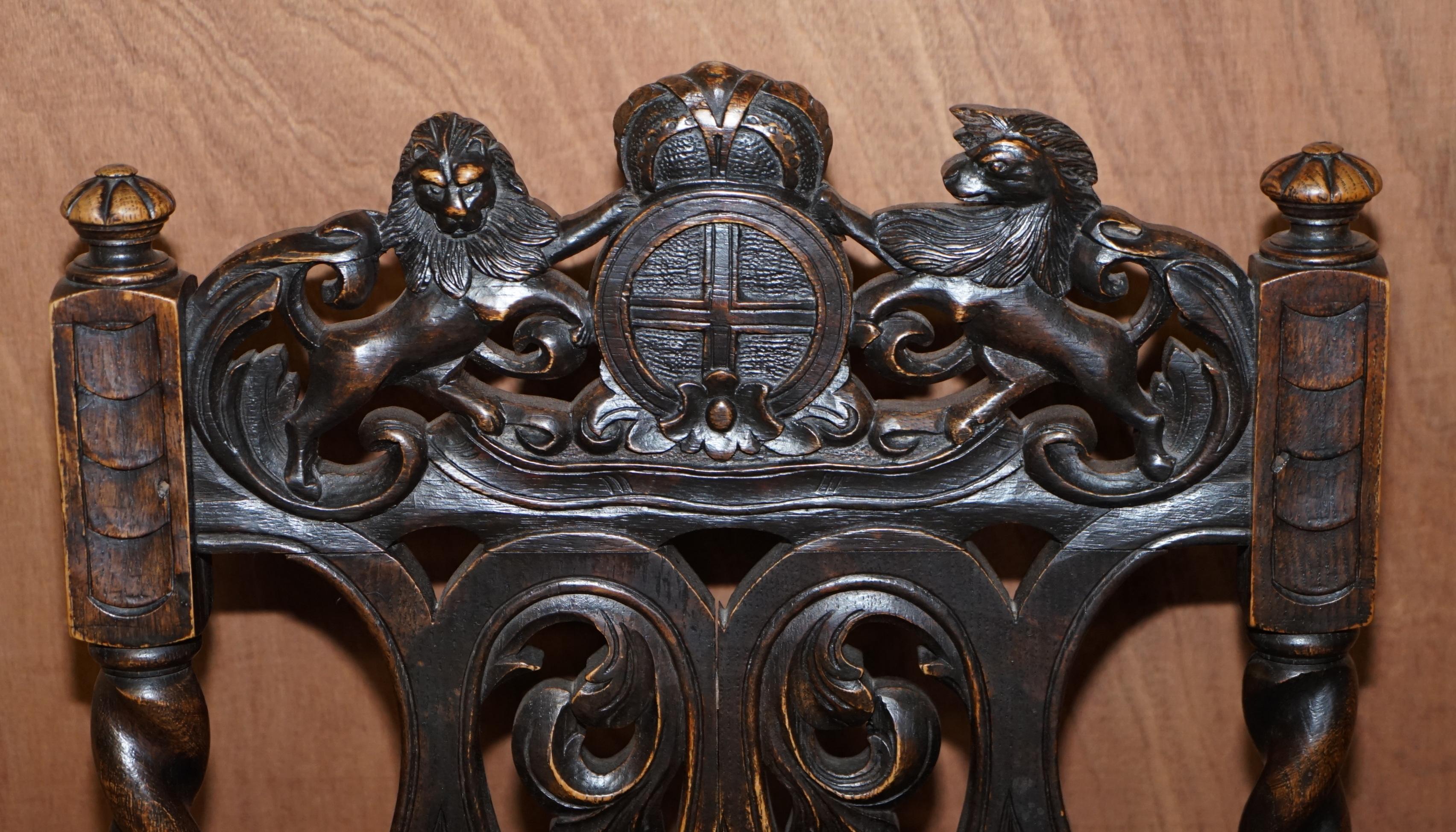 Leather Eight Hand Carved Armorial Crest Coat of Arms Antique Jacobean Dining Chairs For Sale