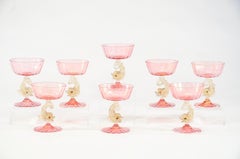 Eight Handblown Venetian/Murano Pink Rose Champagne Coupes with Figural Dolphins