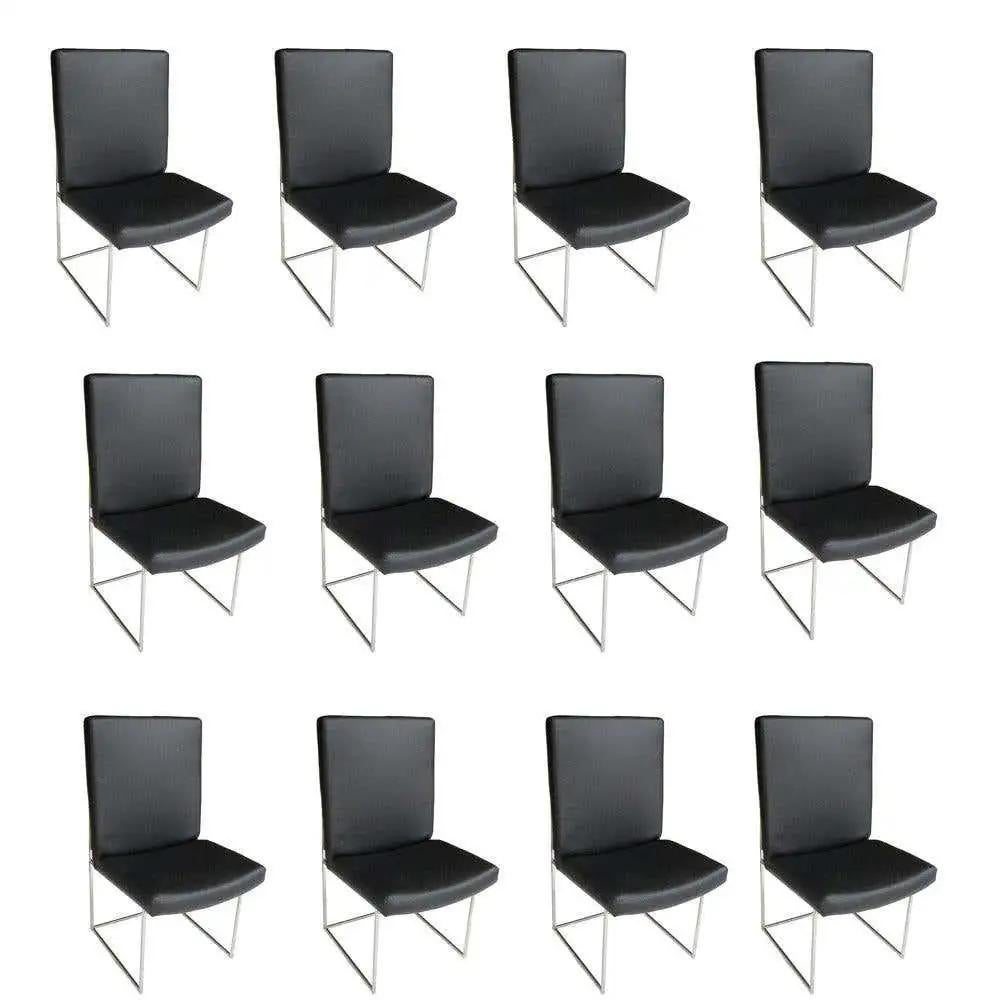 Huit chaises de salle à manger Thin Series conçues par Milo Baughman.

Revêtues d'un cuir noir souple sur une base tubulaire chromée, ces chaises sont l'incarnation de l'élégance.

Mesures : Hauteur : 36 po (91,44 cm)
Largeur : 50,8 cm (20