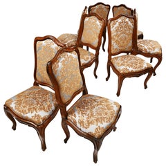 Eight Italian Chairs in Carved Walnut, Genoa, circa 1750