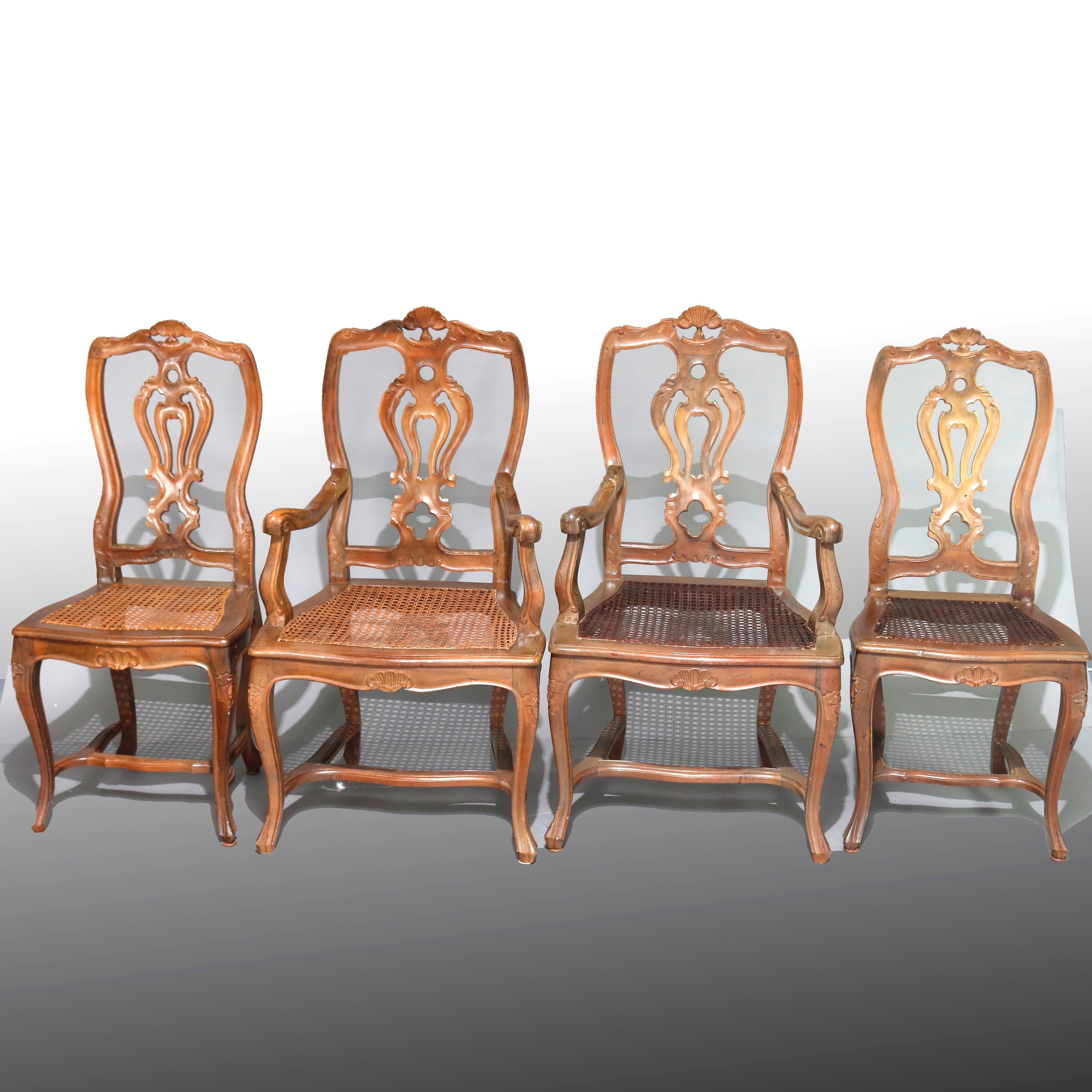Eight Italian Renaissance Revival Carved Fruitwood and Caned Dining Chairs 5