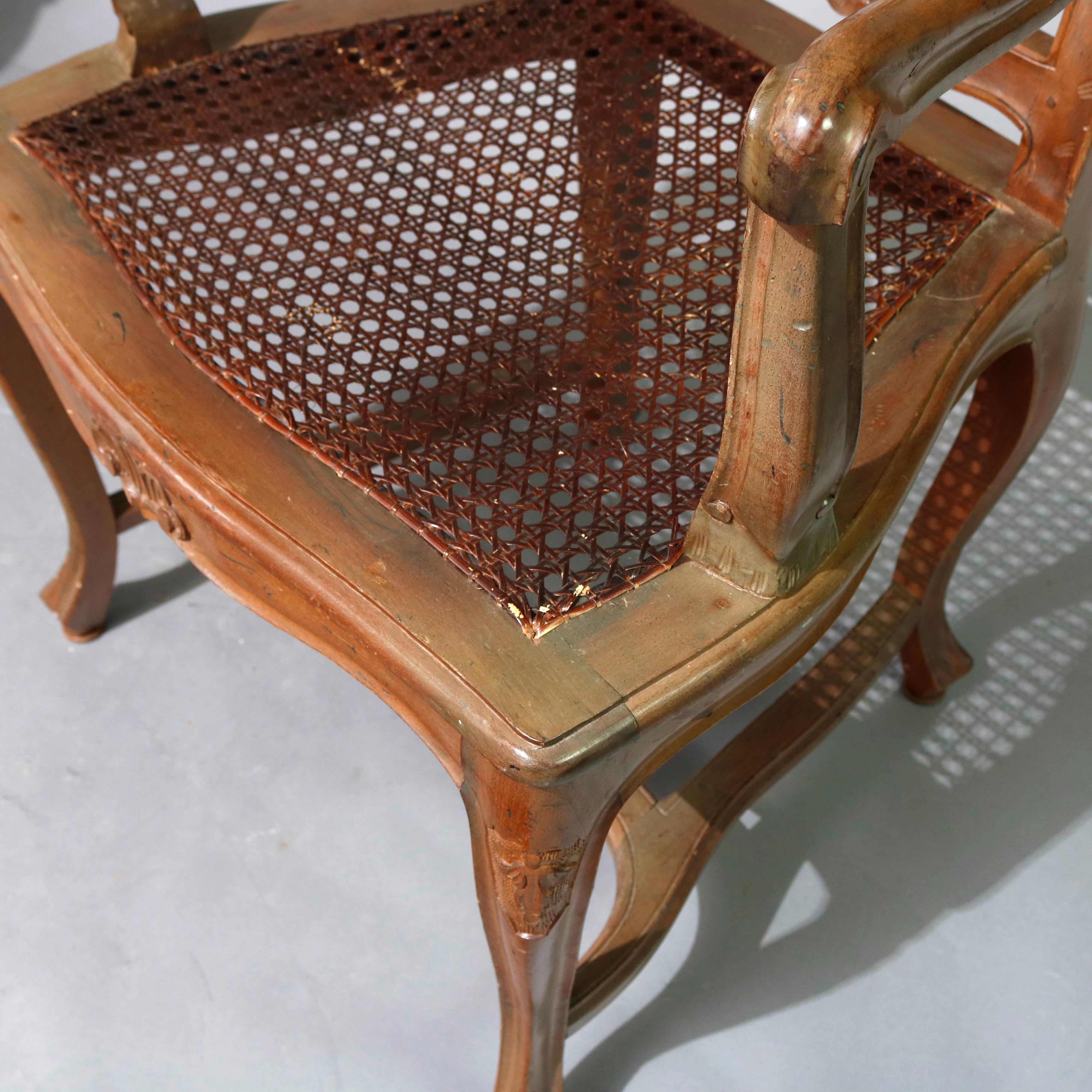 Eight Italian Renaissance Revival Carved Fruitwood and Caned Dining Chairs 9