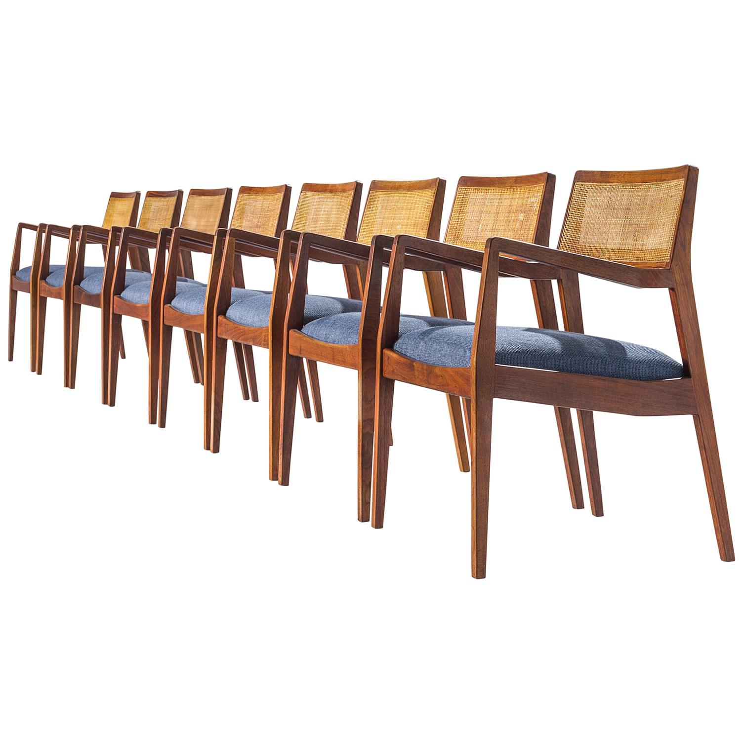 Eight Jens Risom Walnut "Playboy" Armchairs