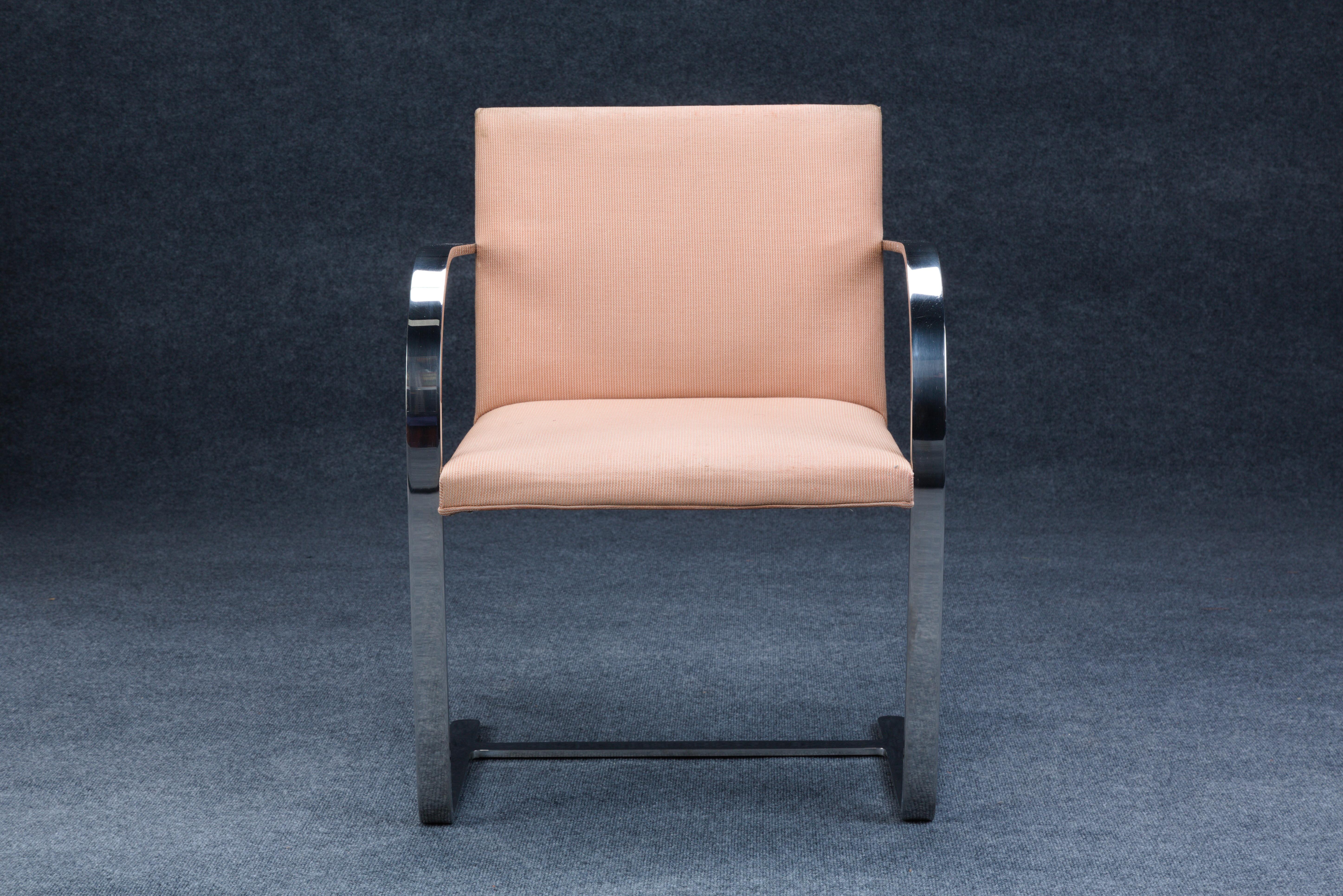 Eight Ludwig Mies van der Rohe (German, 1886-1968) for Knoll International Brno Chairs, United States, 1982, polished stainless steel frames, original upholstery, with Knoll International manufacturer's labels, ht. 31 1/2, wd. 23, dp. 20 in. Seat