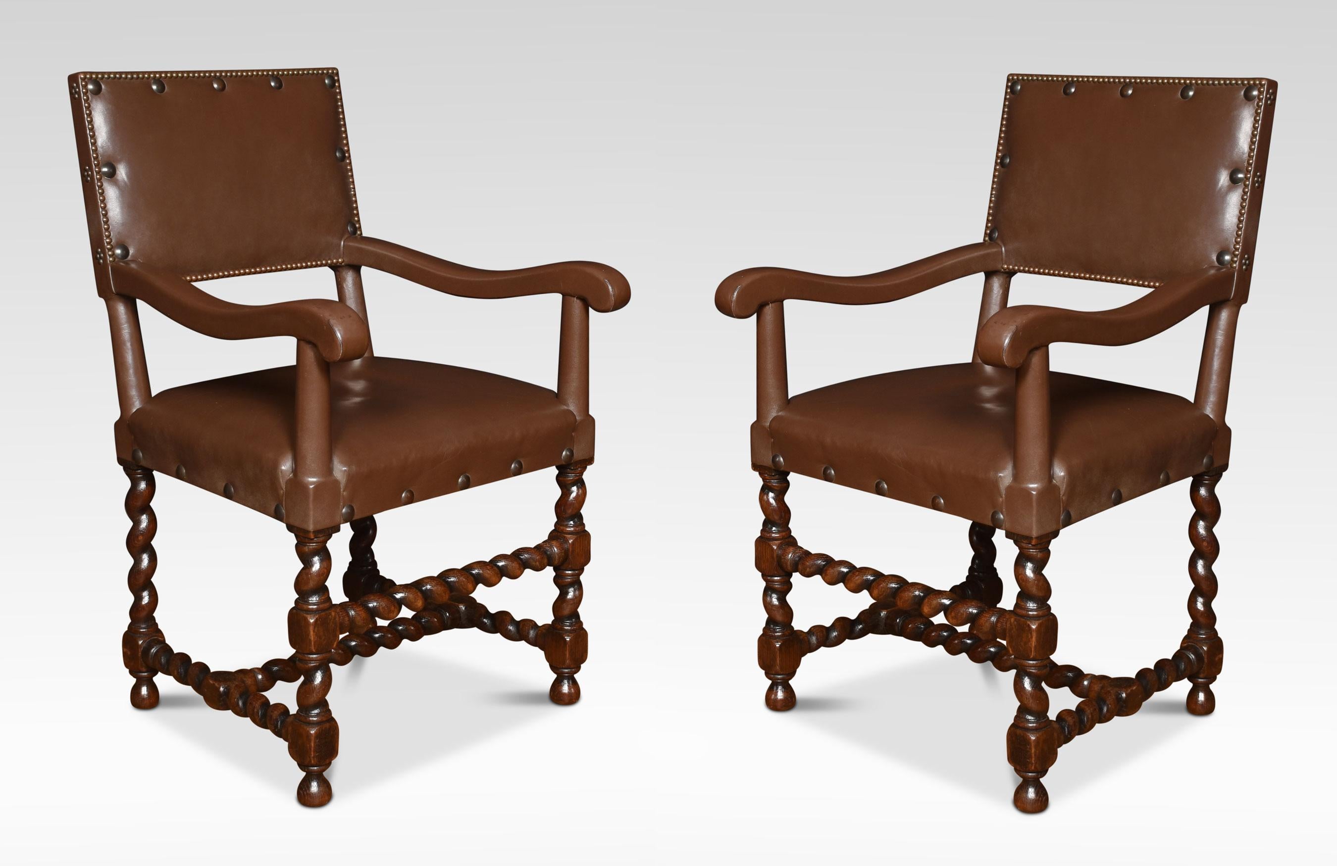 Set of eight dining chairs the square leather nailed backs above overstuffed seats the carvers with padded arms all raised up on turned front legs united by stretchers.
Dimensions
Armchairs
Height 37.5 Inches Height to seat 20.5 Inches
Width