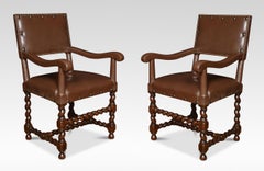 Eight Leather Upholstered Oak Dining Chairs