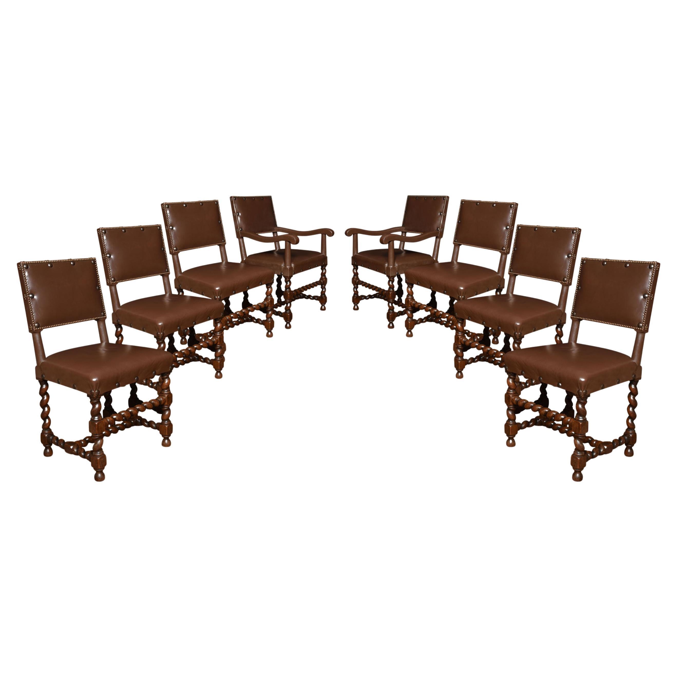 Eight Leather Upholstered Oak Dining Chairs