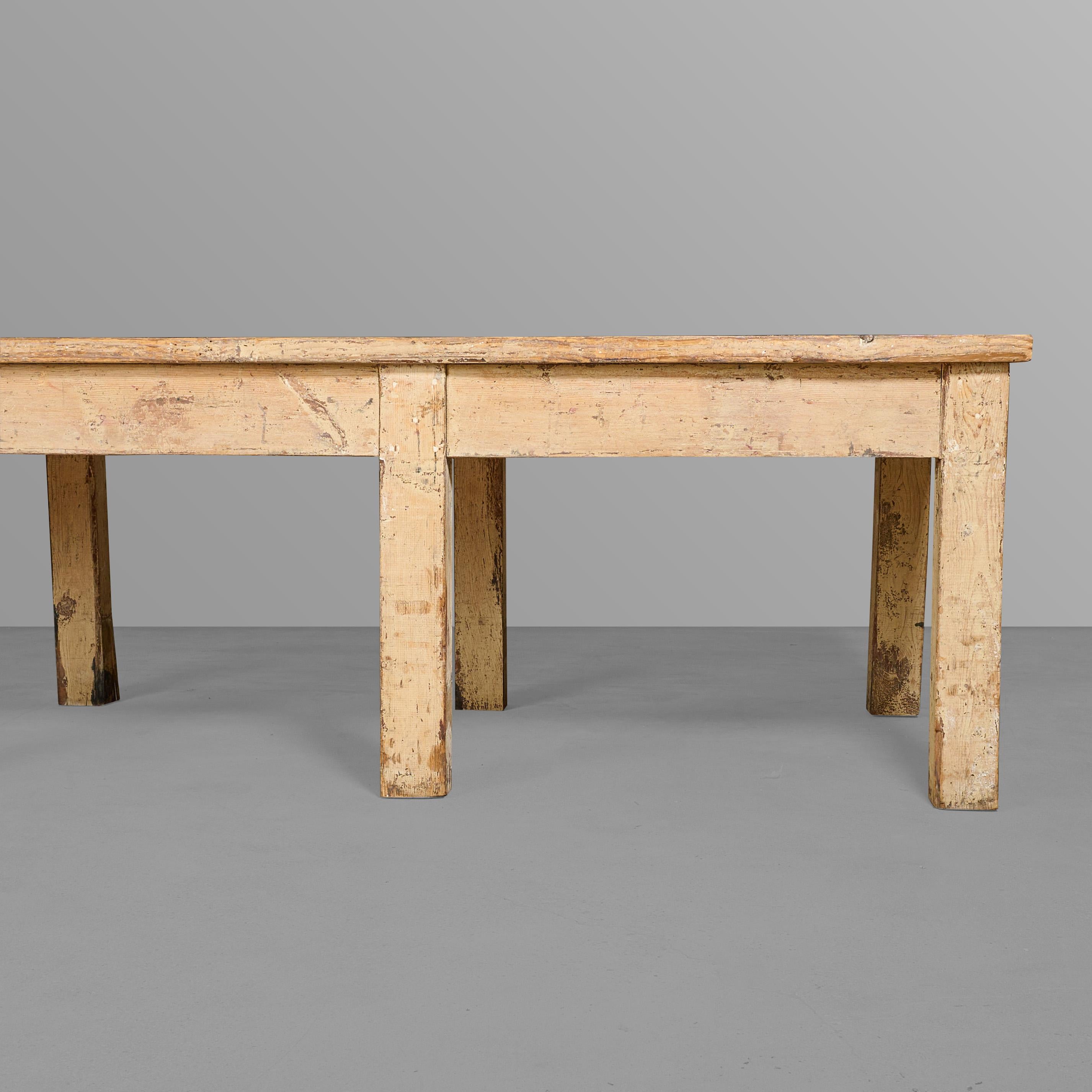 Large and heavy duty eight leg table with tenon construction. Very nice patina.

