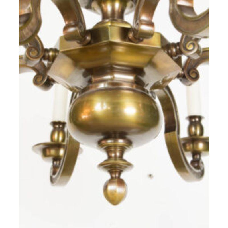 Eight Light Chandelier, solid cast brass with substantial arms. Early Mid 20th Century. Completely restored with a dark antique patina. Rewired.

Shipping quote is for white glove,  please inquire for additional shipping quotes with blanket wrap.  