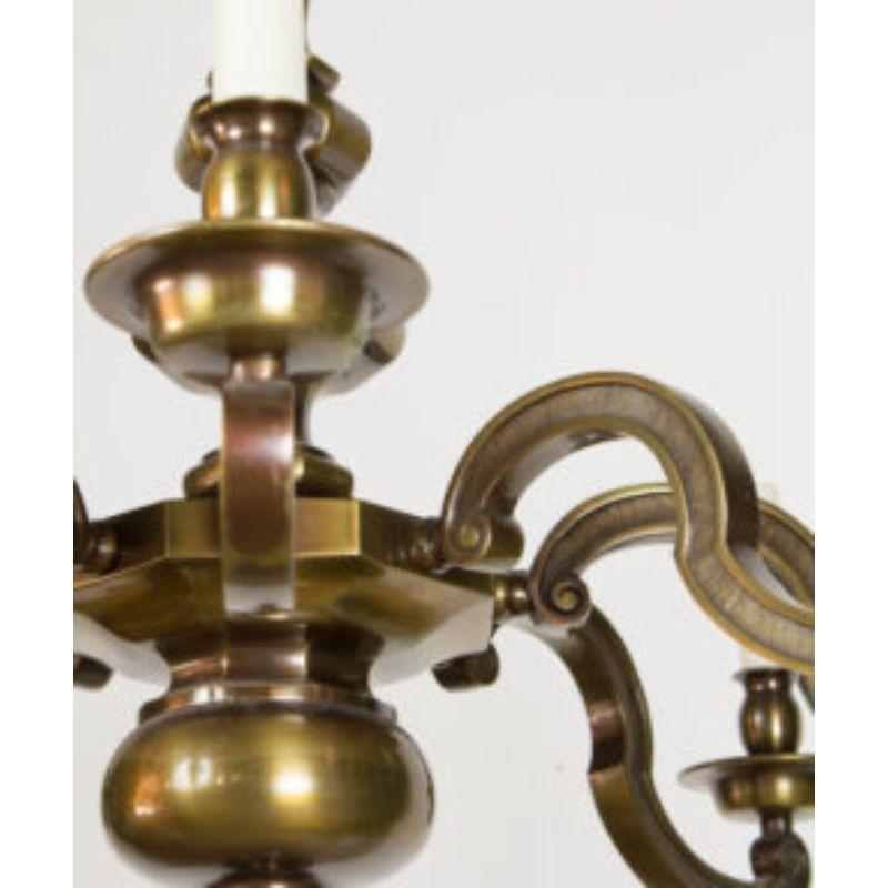 Revival Eight Light Antique Brass Chandelier For Sale