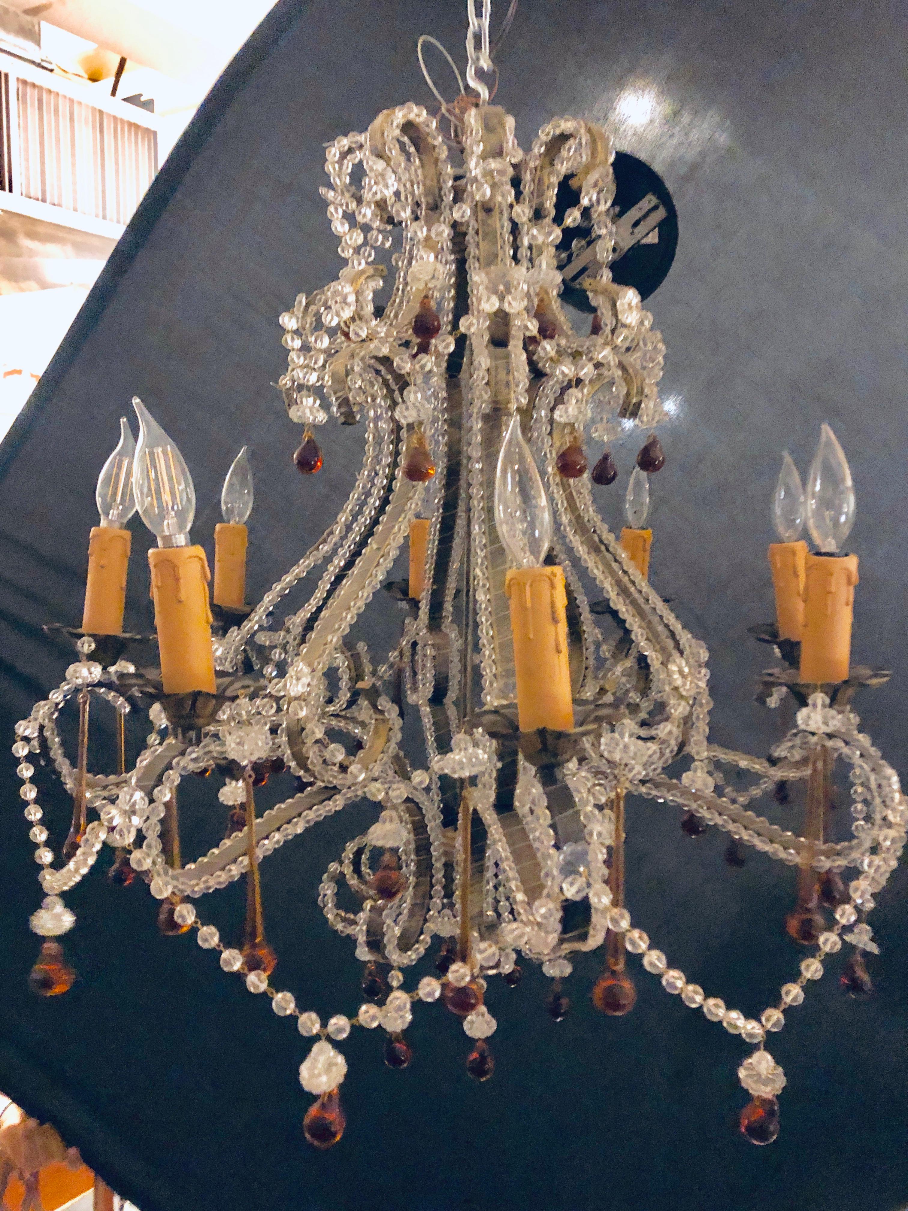 Eight light beaded chandelier with colored tear drop prisms, circa 1960.