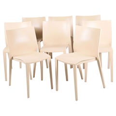 Eight Light Cream Color Plastic Chairs Slick Slick by Philippe Starck