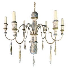Eight Light Italian Wood Painted Chandelier with Tassels Description