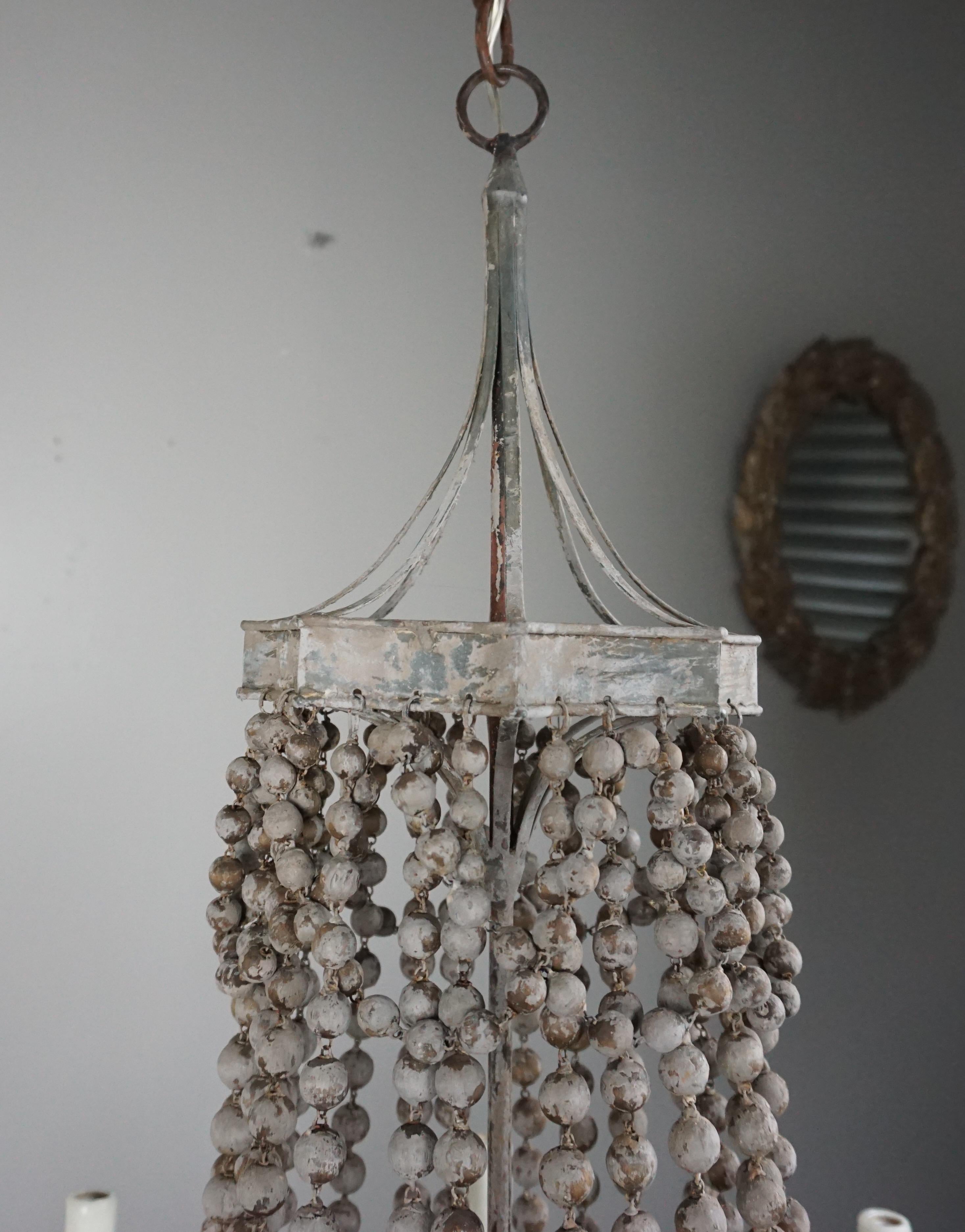 Mid-20th Century Eight Light Painted Wood Beaded Chandelier