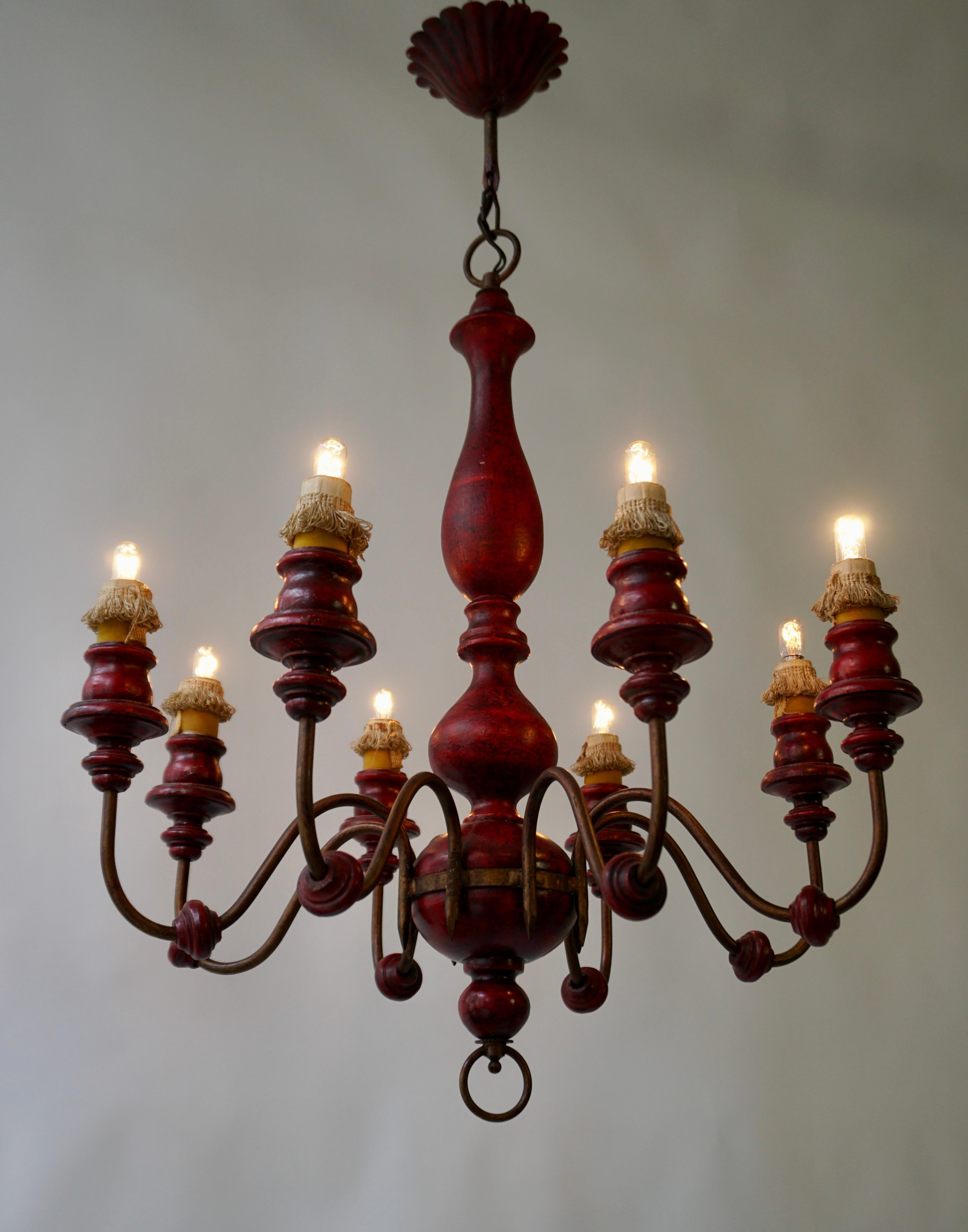 Mid-Century Modern Eight Light Red painted Wood and Iron Chandelier For Sale