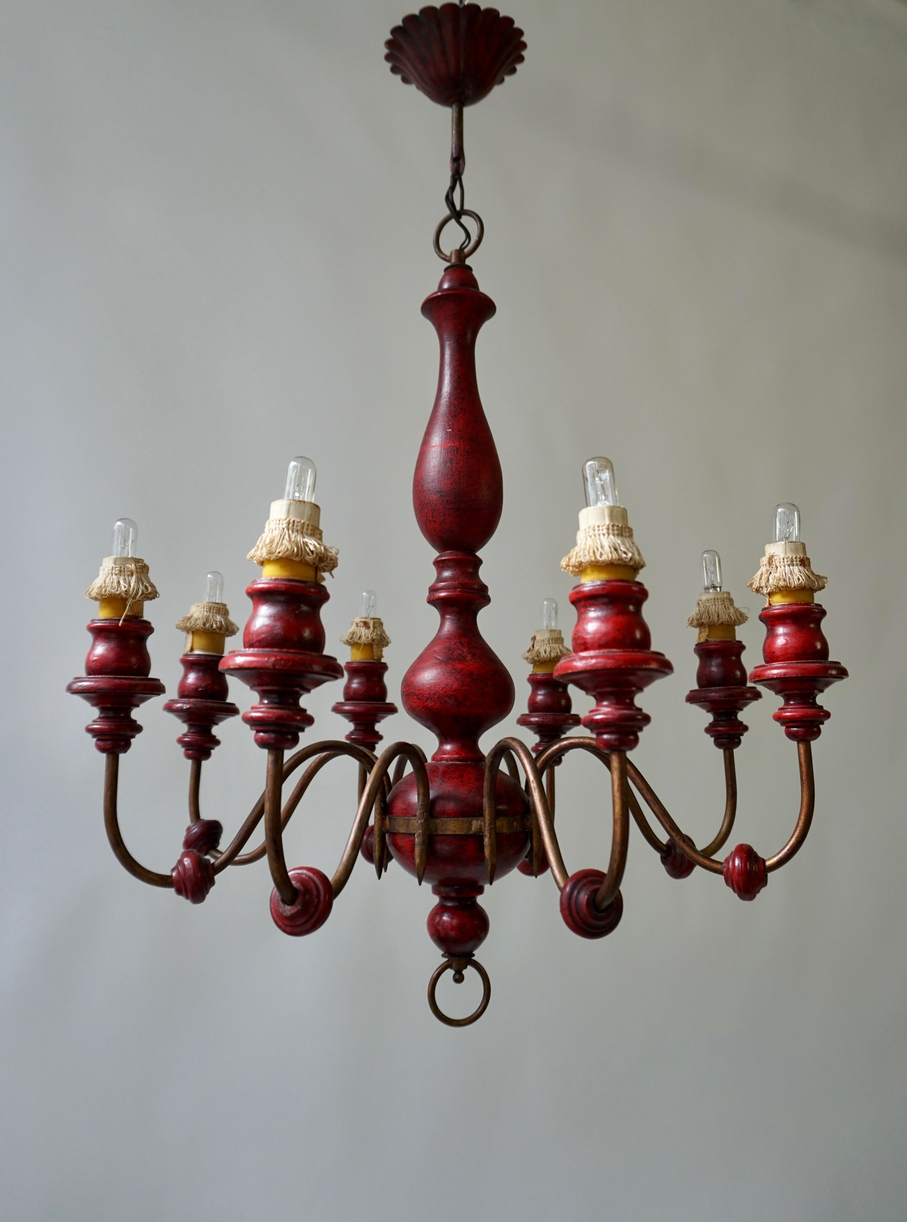 Italian Eight Light Red painted Wood and Iron Chandelier For Sale