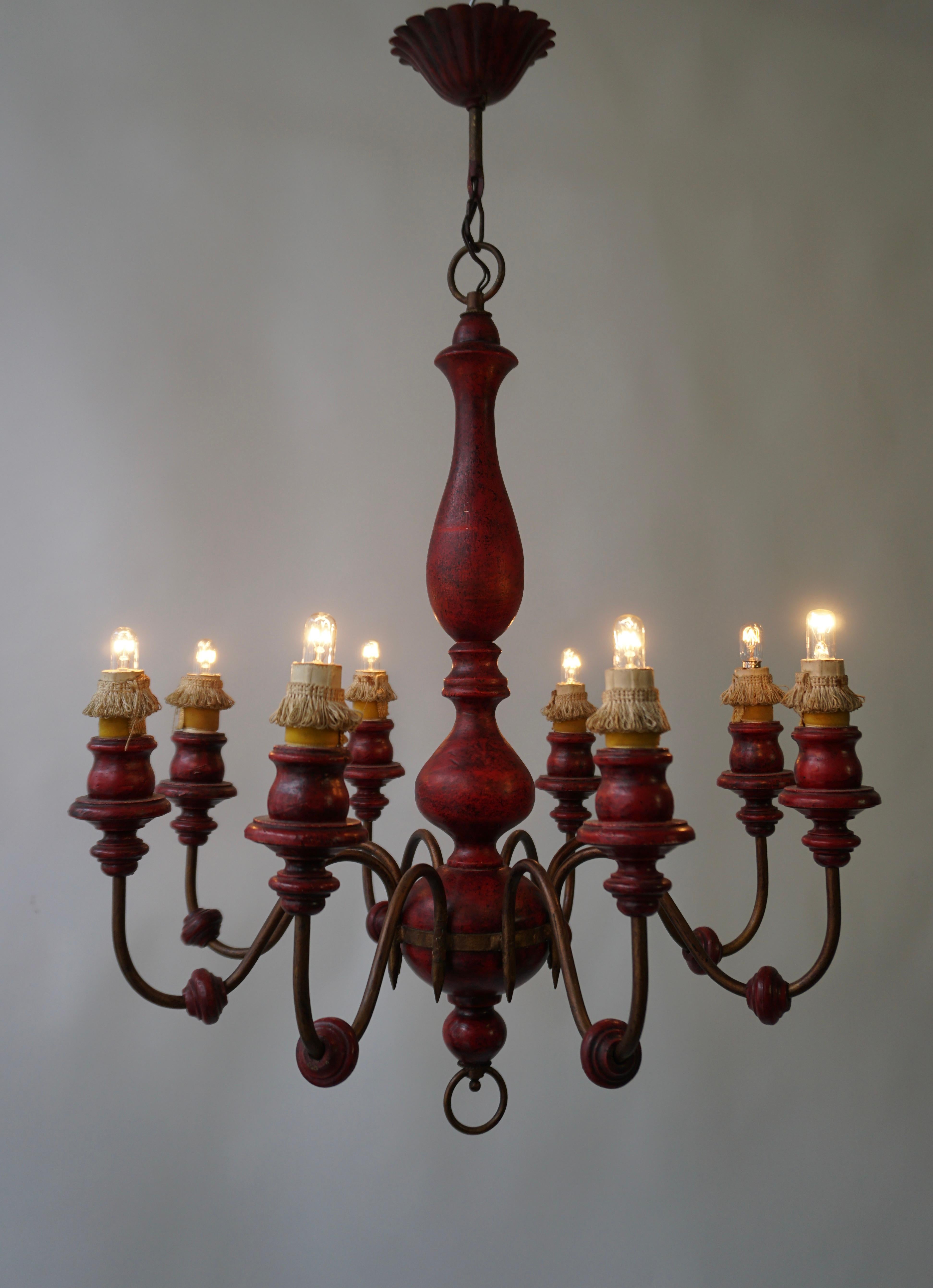 Painted Eight Light Red painted Wood and Iron Chandelier For Sale