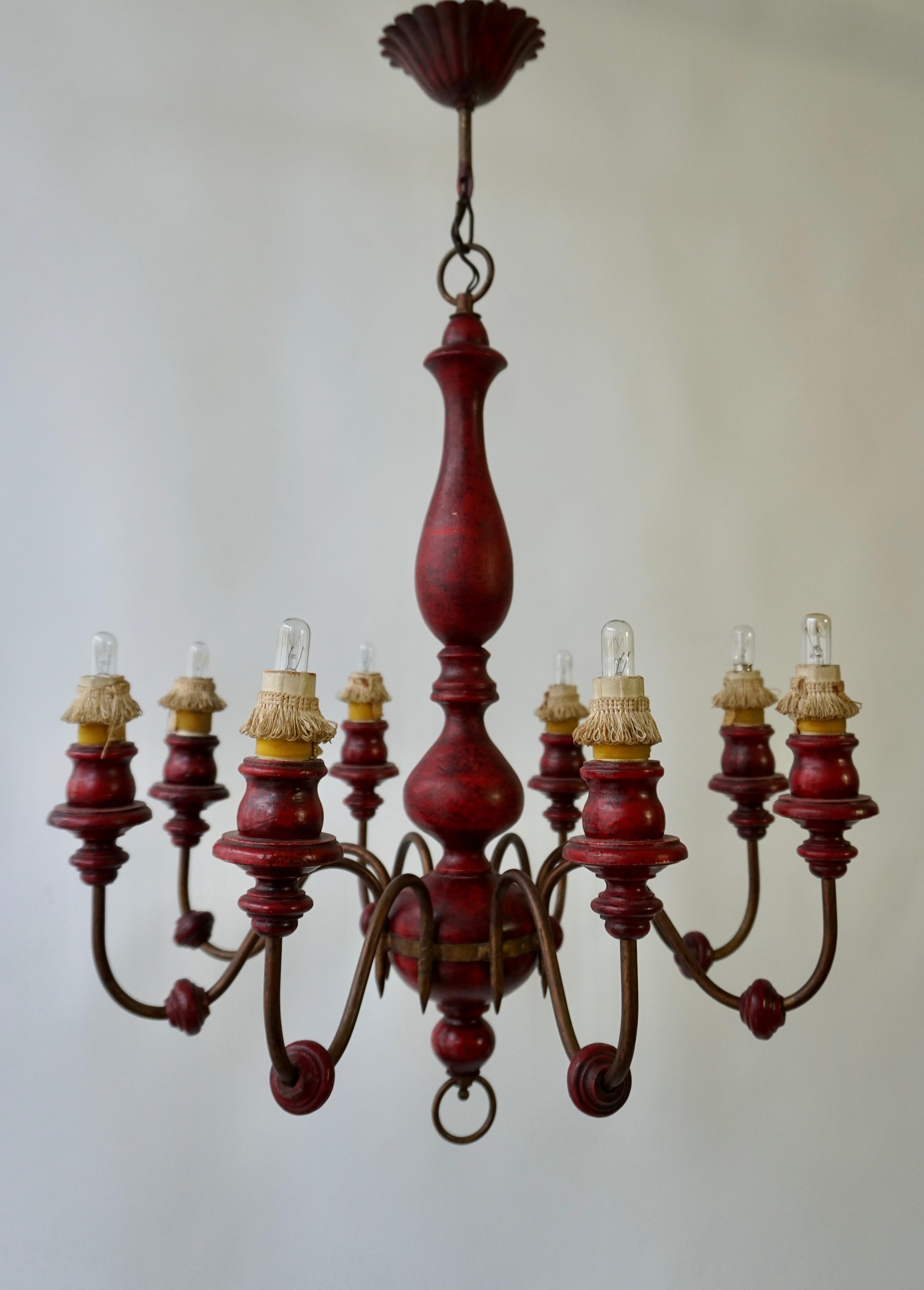 Metal Eight Light Red painted Wood and Iron Chandelier For Sale