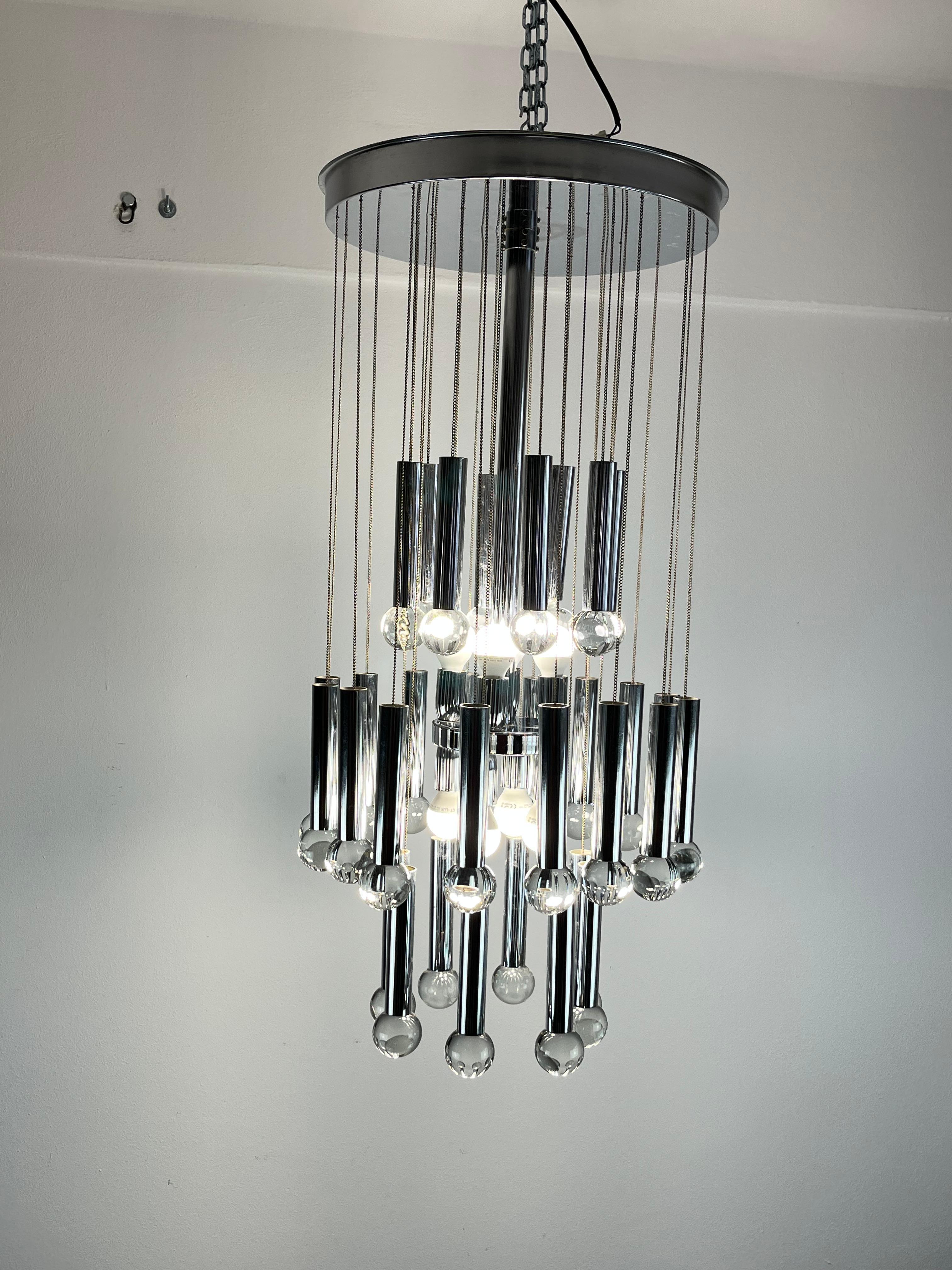 Eight-light steel and glass chandelier by Gaetano Sciolari, Italy, 1970s.
Small signs of wear, but overall in excellent condition

From Wikipedia, the free encyclopedia
Angelo Gaetano Sciolari (1927-1994) was the owner of Sciolari Lighting and