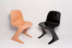 Acht schwarze Känguru-Stühle aus der Mitte des Jahrhunderts, entworfen von Ernst Moeckl, Deutschland, 1960er Jahre