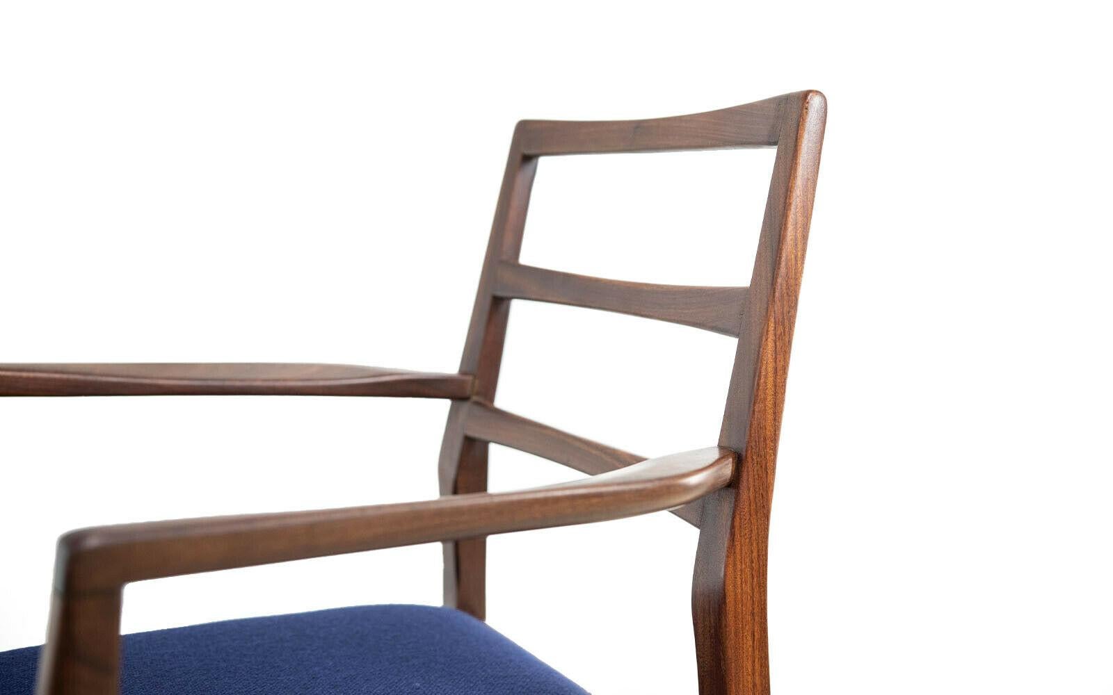 Richard Hornby dining chairs 

A set of eight British mid century dining chairs (6 regular and 2 carvers) by Richard Hornby for Fyne Ladye, retailed through Heals. Carved from solid Afrormosia teak, the seat pads have new foam and have been