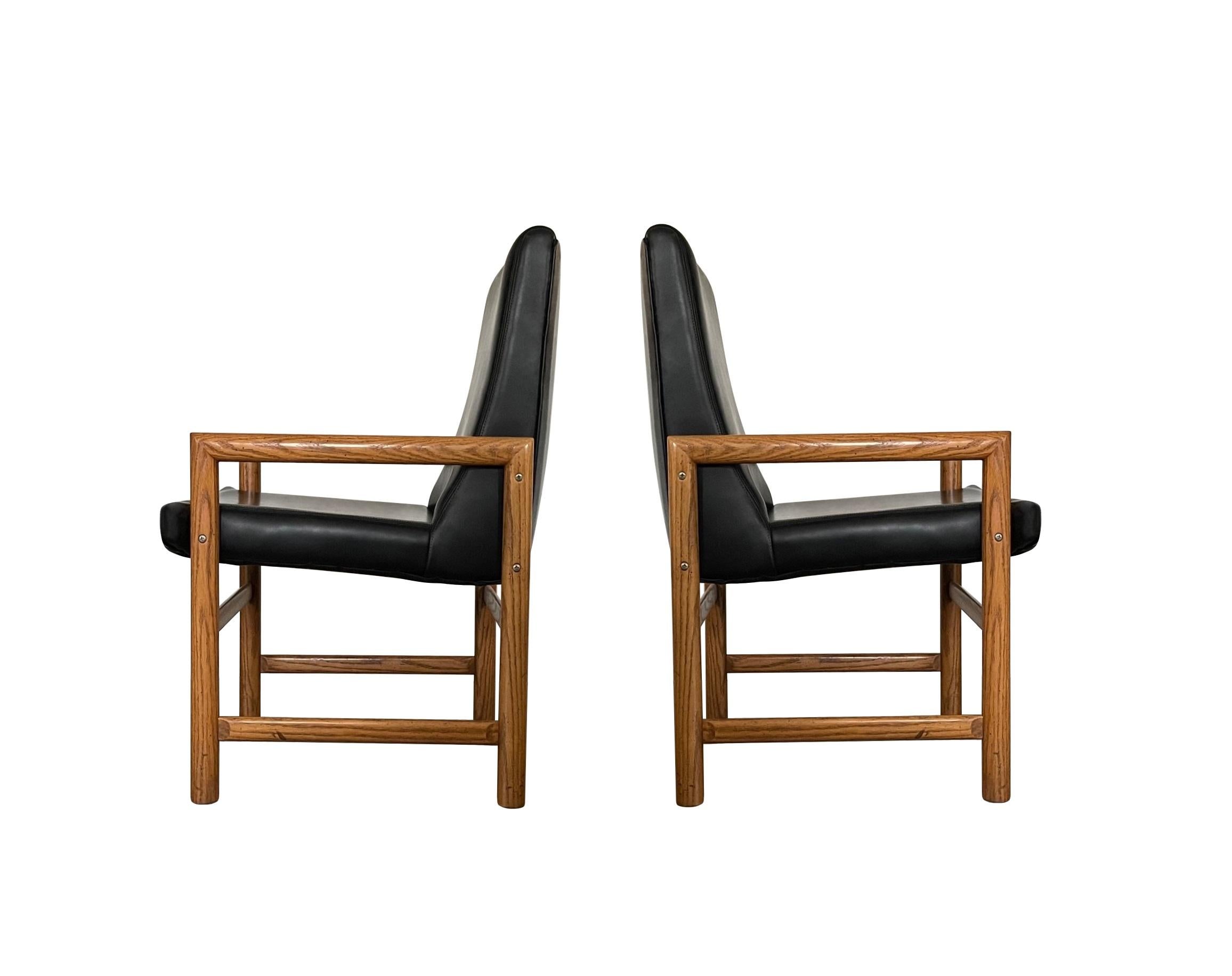 Eight Mid-Century Modern Black Leather Dining Armchairs For Sale 5