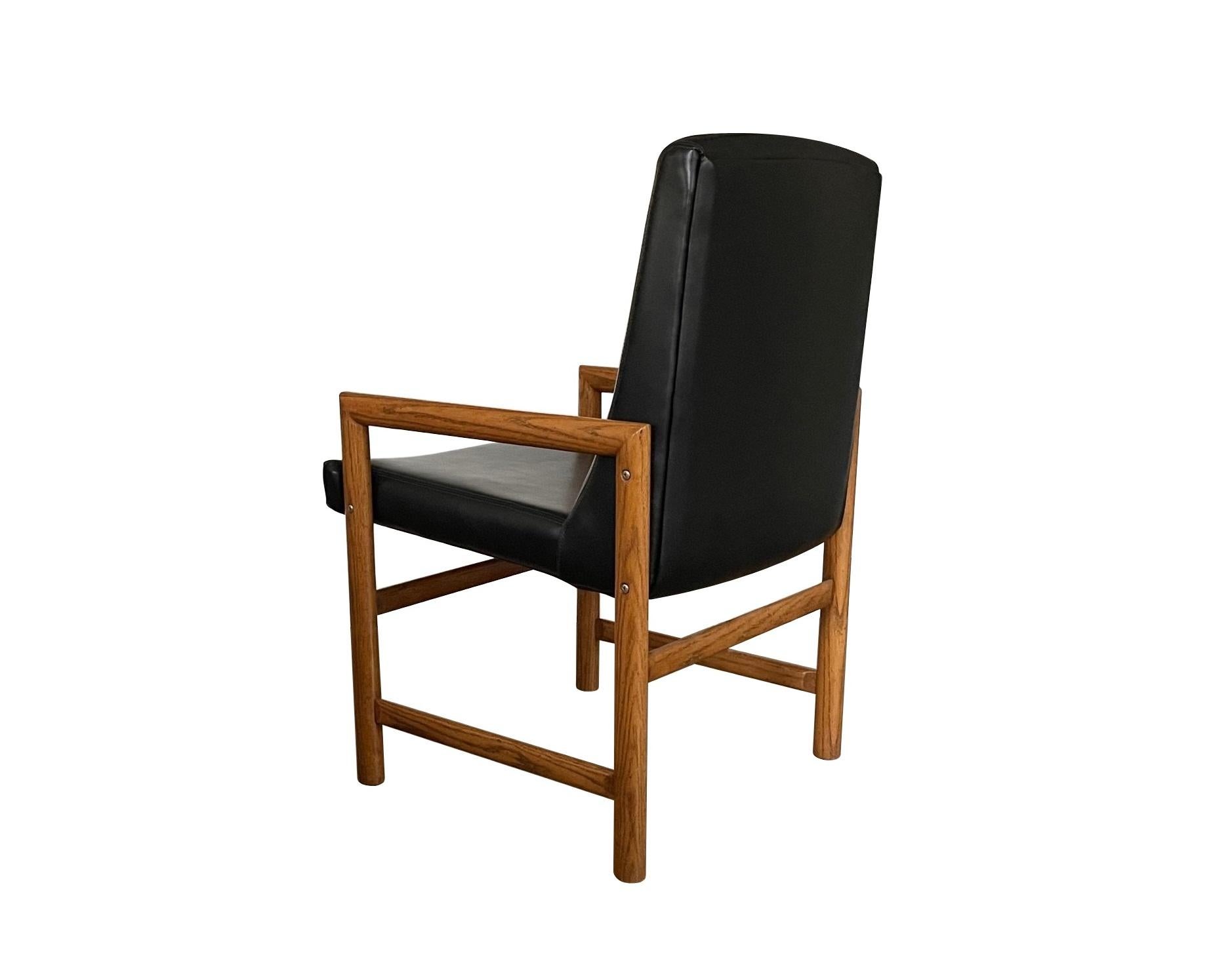 Eight Mid-Century Modern Black Leather Dining Armchairs For Sale 8