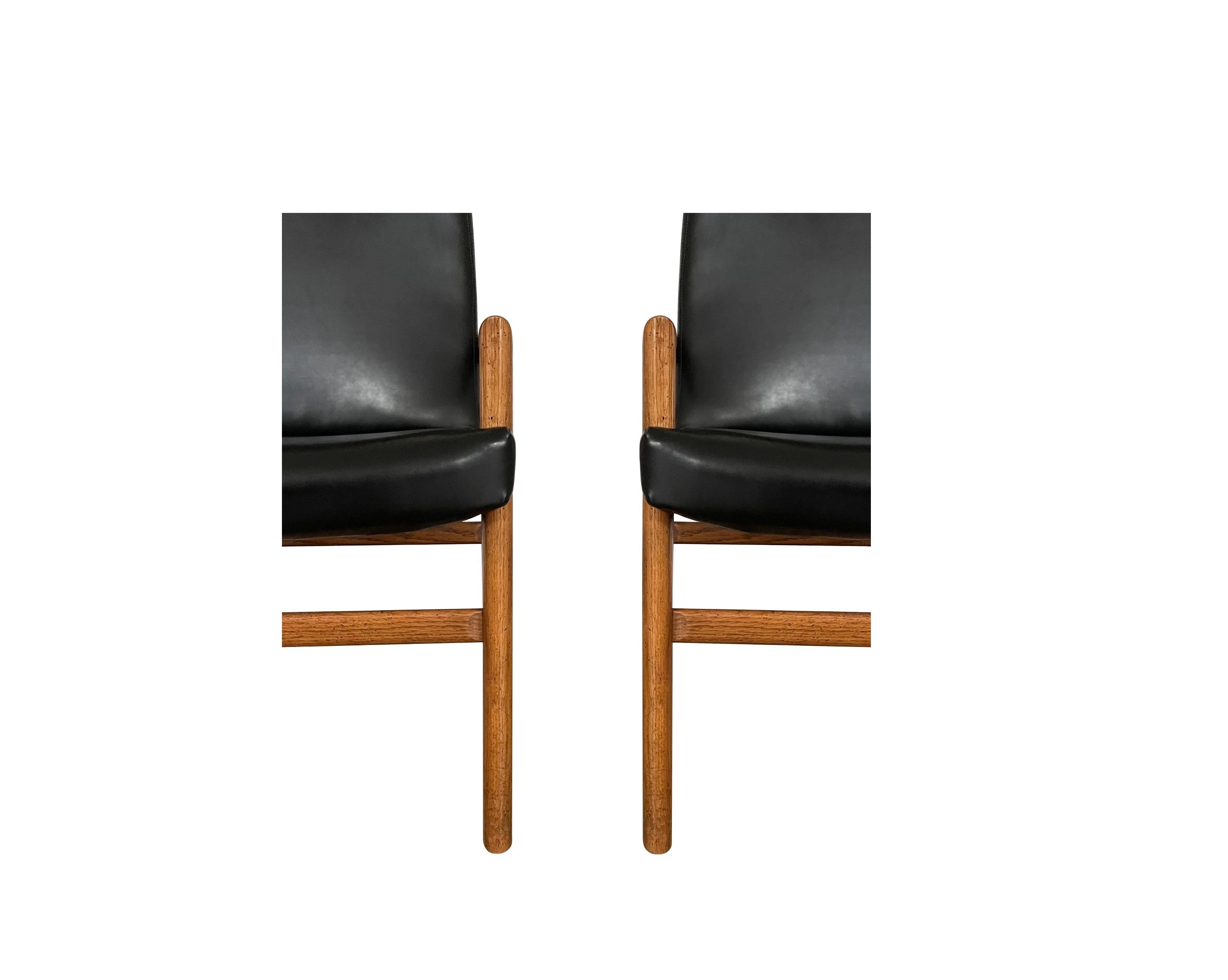 Eight Mid-Century Modern Black Leather Dining Armchairs For Sale 3