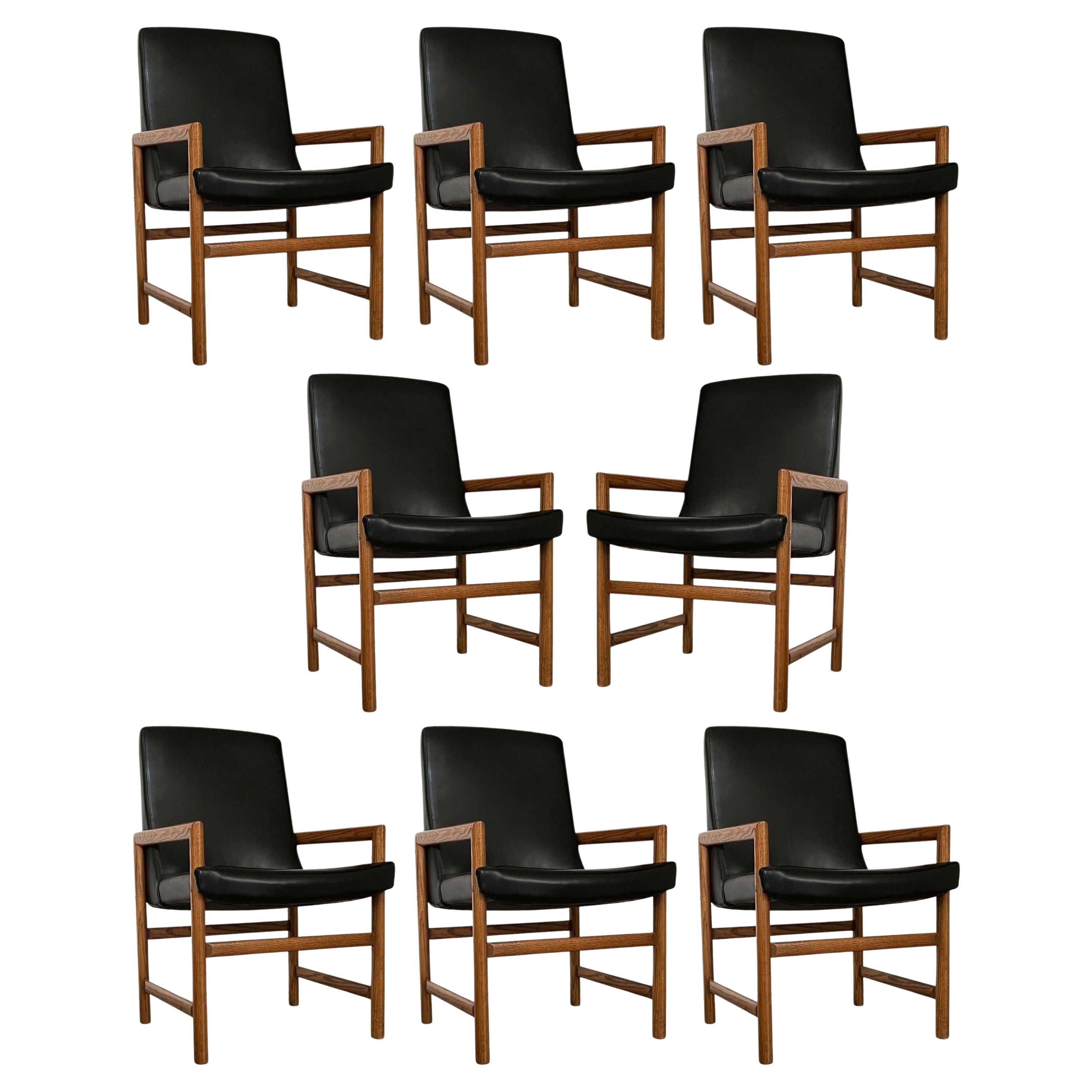 Eight Mid-Century Modern Black Leather Dining Armchairs For Sale