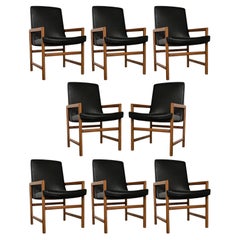 Eight Mid-Century Modern Black Leather Dining Armchairs